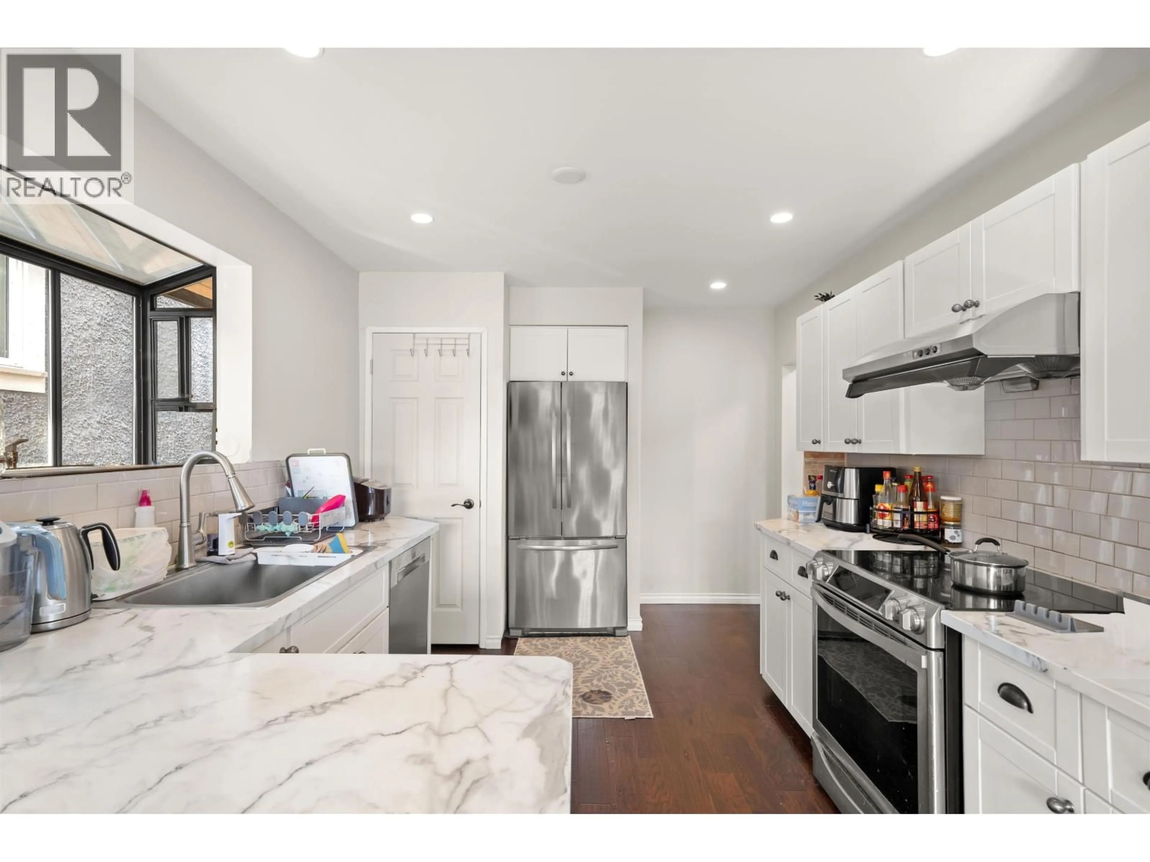 Open concept kitchen, ceramic/tile floor for 1554 65TH AVE AVENUE, Vancouver British Columbia V6P2R1