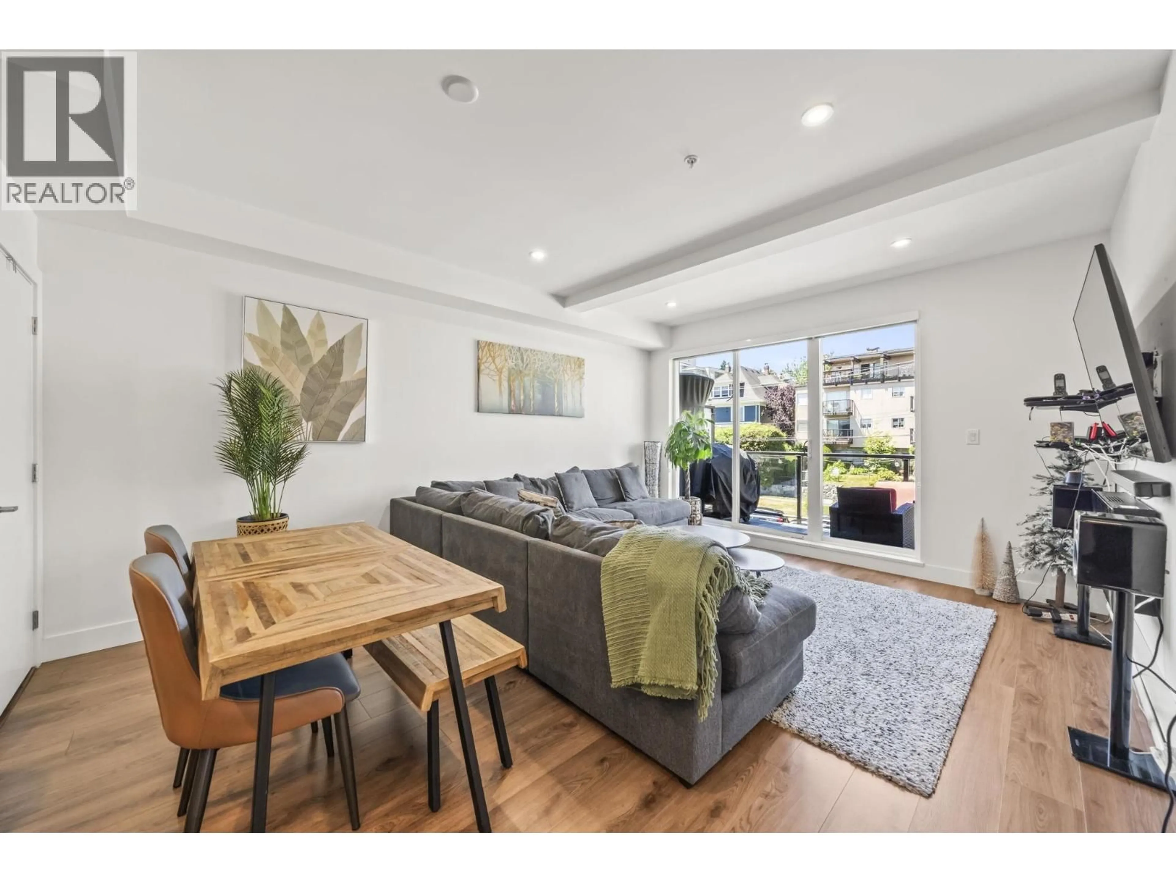 Living room with furniture, wood/laminate floor for 507 - 218 CARNARVON STREET, New Westminster British Columbia V3L1B8