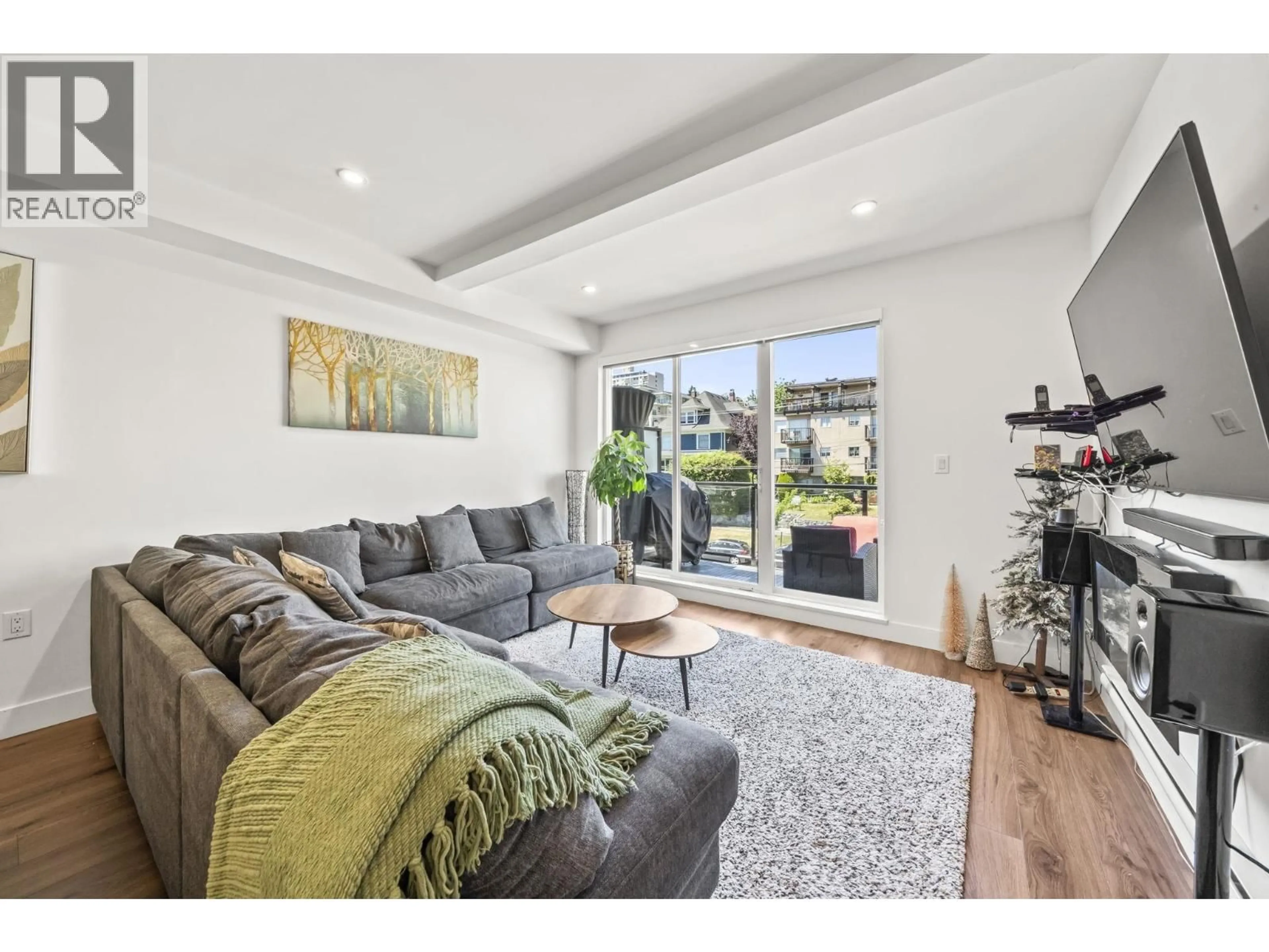 Living room with furniture, wood/laminate floor for 507 - 218 CARNARVON STREET, New Westminster British Columbia V3L1B8