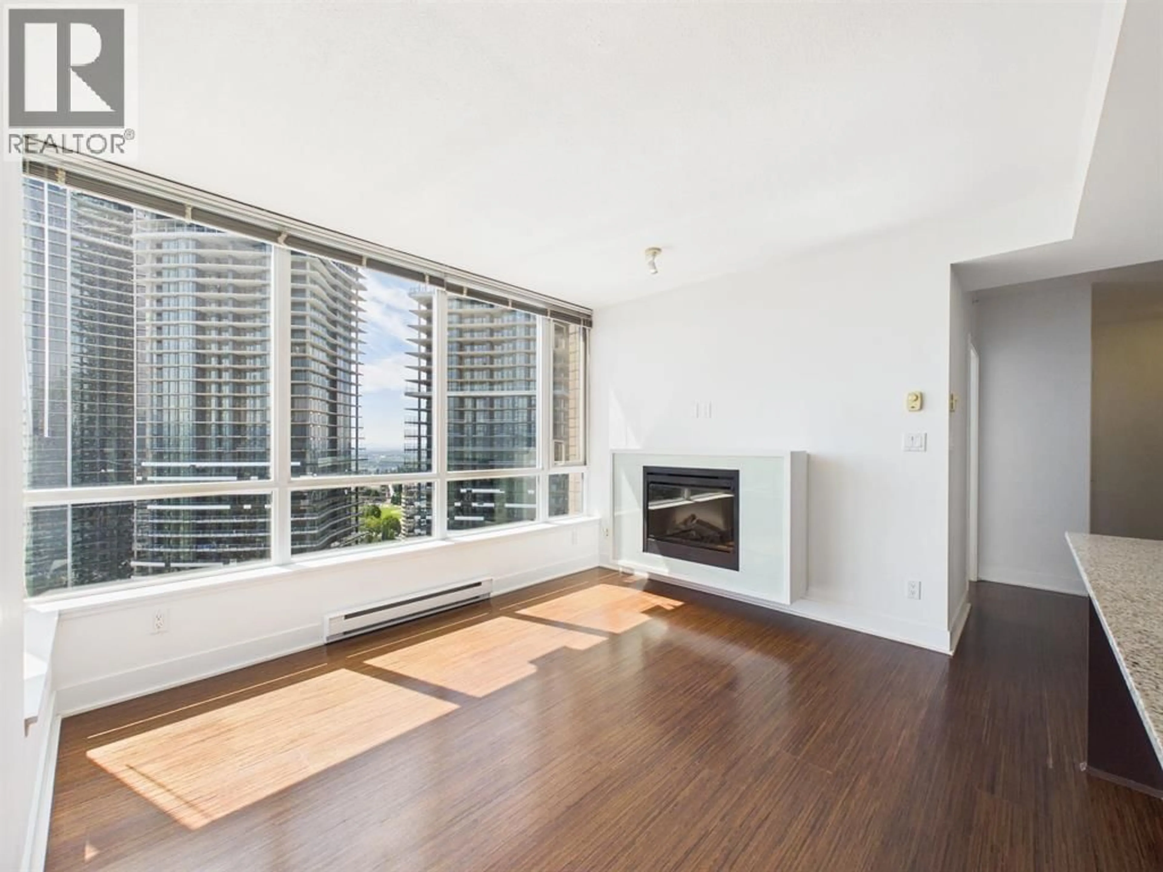 Living room with furniture, wood/laminate floor for 3106 - 4808 HAZEL STREET, Burnaby British Columbia V5H0A2