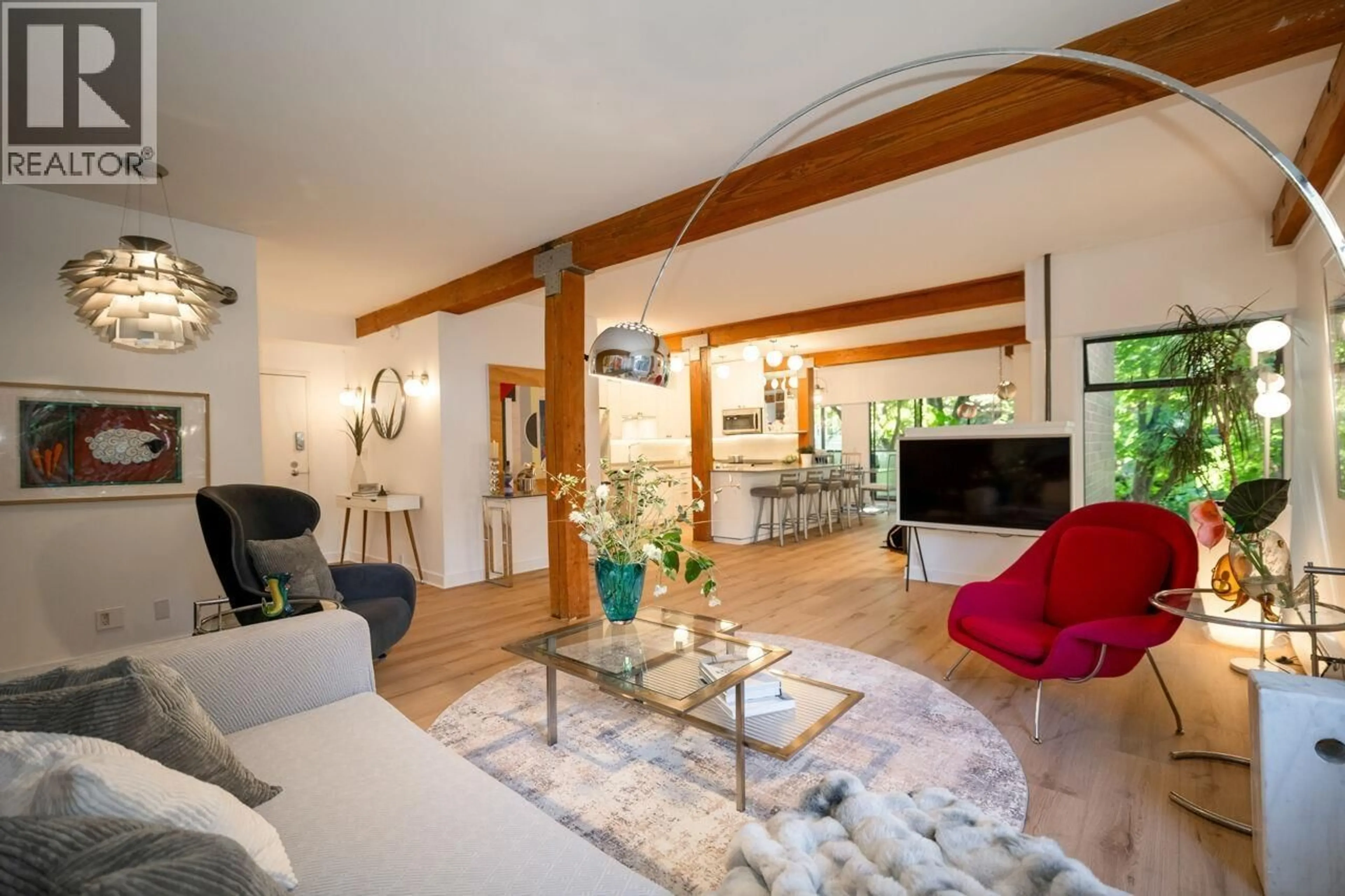 Living room with furniture, wood/laminate floor for 202 - 1535 NELSON STREET, Vancouver British Columbia V6G1M2