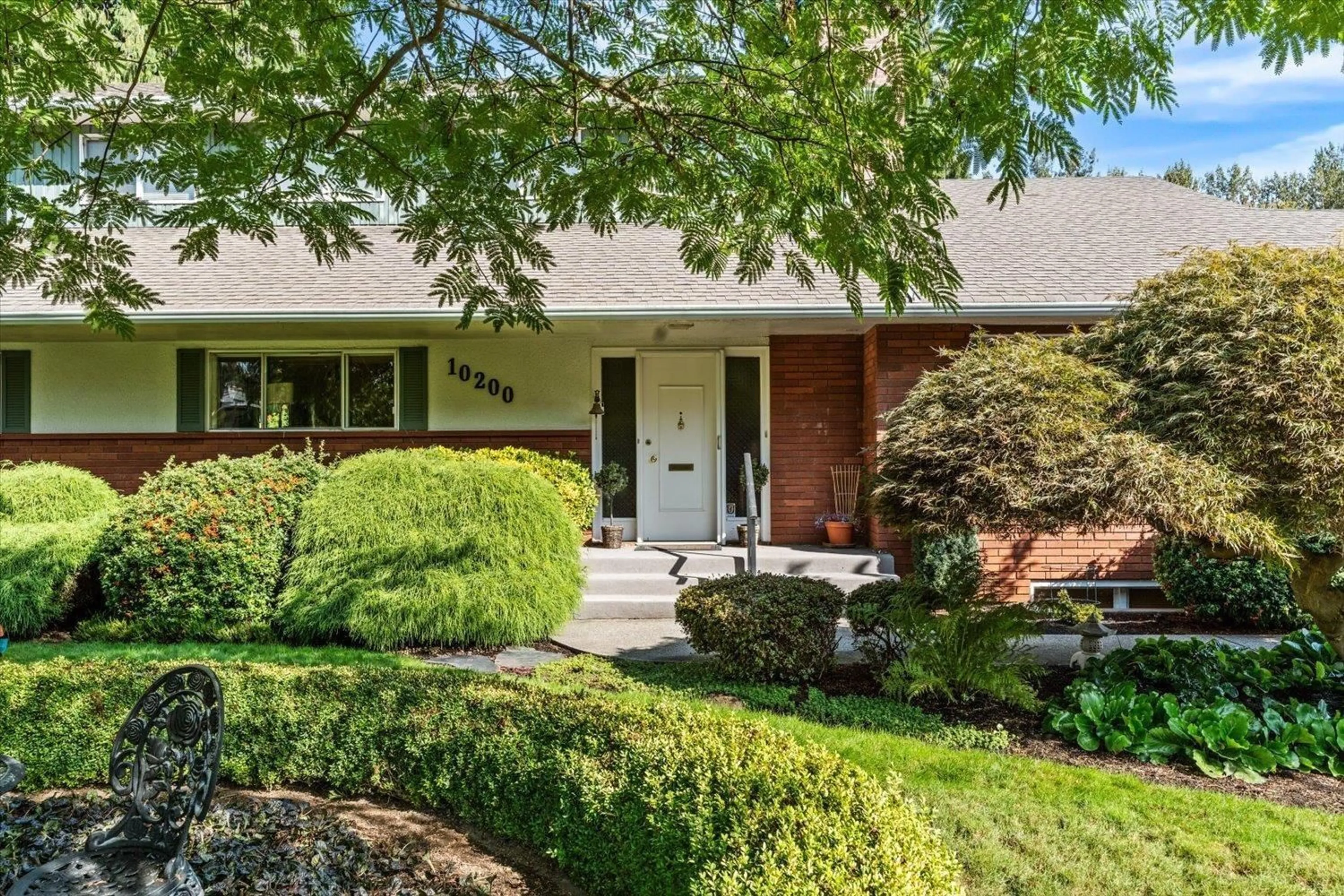 Home with brick exterior material, street for 10200 BRENTWOOD DRIVE, Chilliwack British Columbia V2P6G3