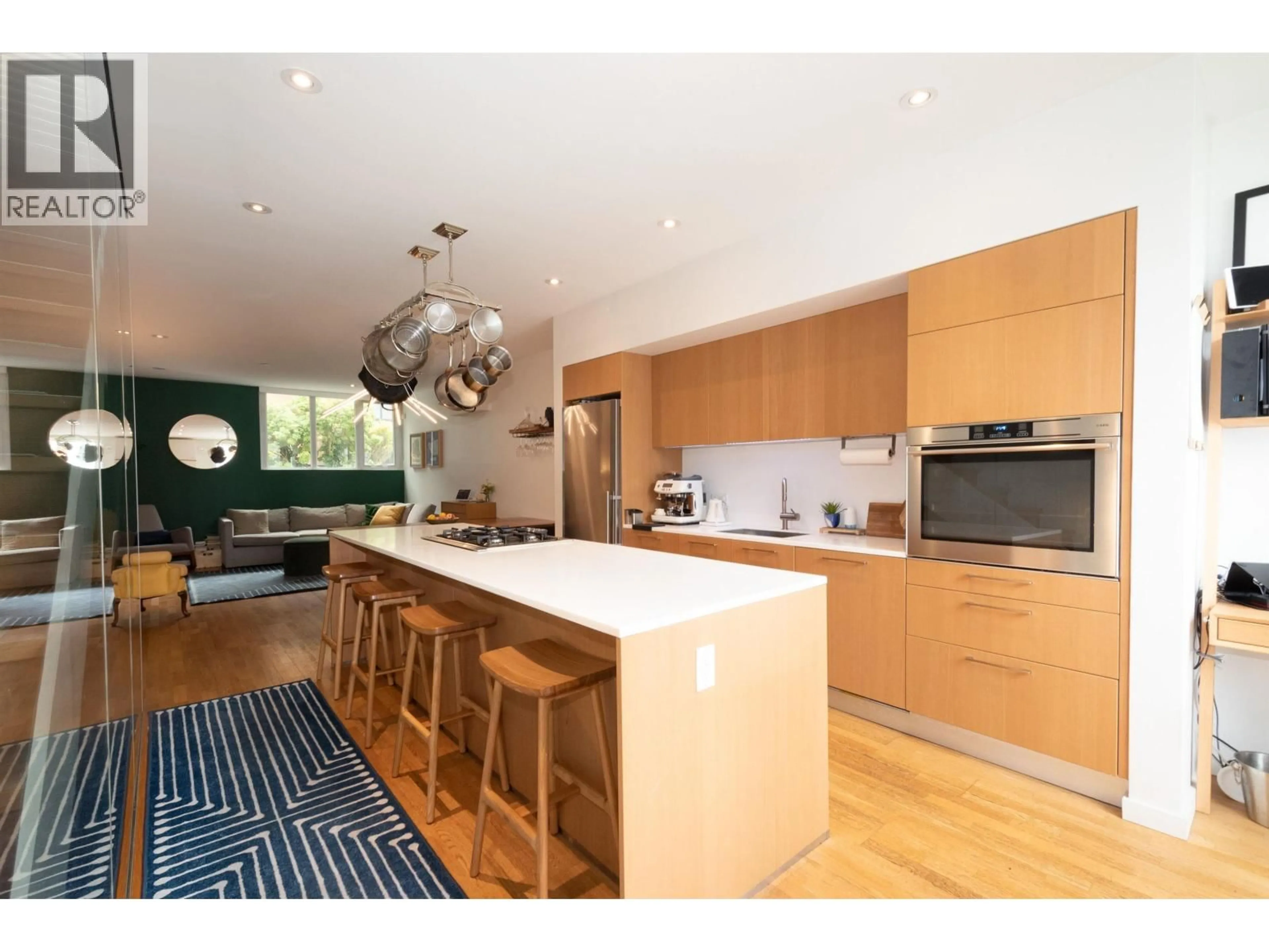 Open concept kitchen, wood/laminate floor for 2220 WILLOW STREET, Vancouver British Columbia V5Z0C8