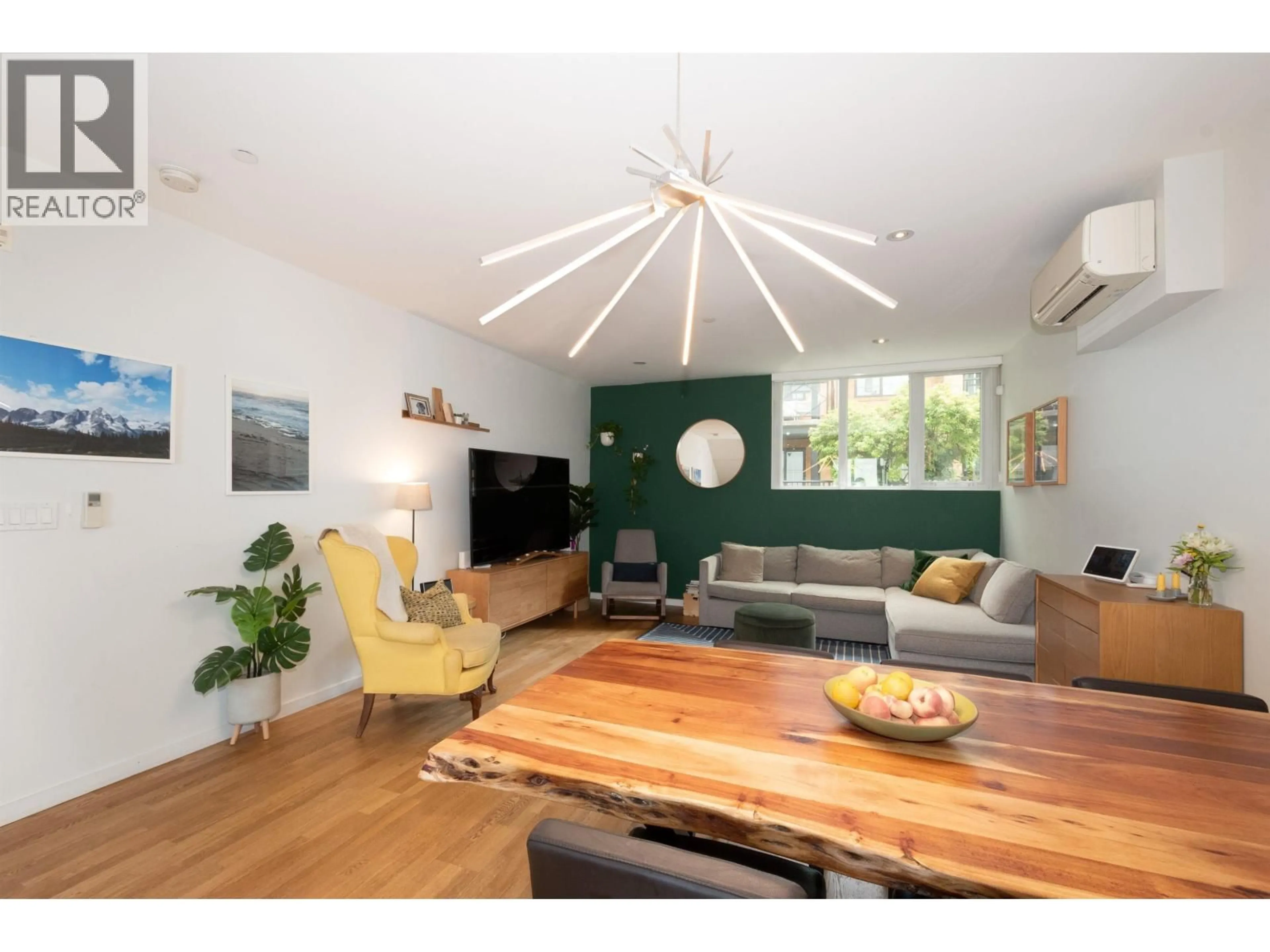 Living room with furniture, wood/laminate floor for 2220 WILLOW STREET, Vancouver British Columbia V5Z0C8