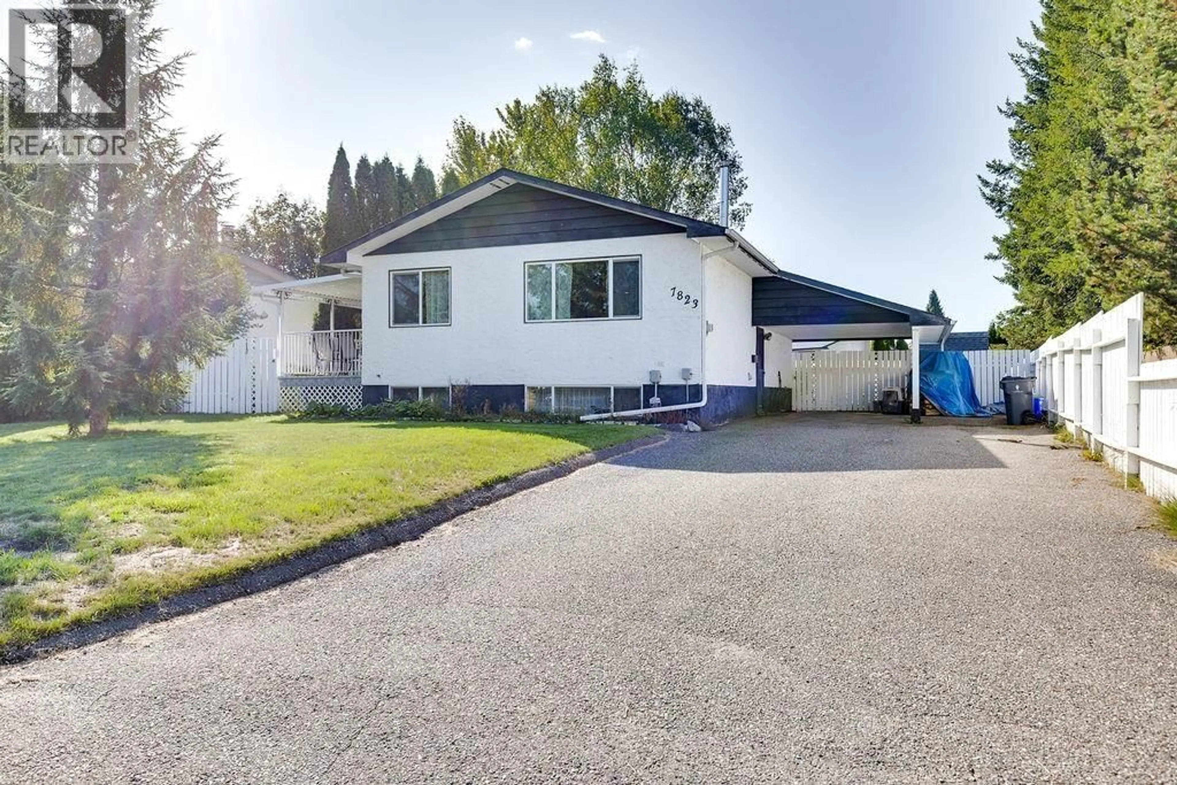 Home with vinyl exterior material, street for 7823 QUEENS CRESCENT, Prince George British Columbia V2N3H3