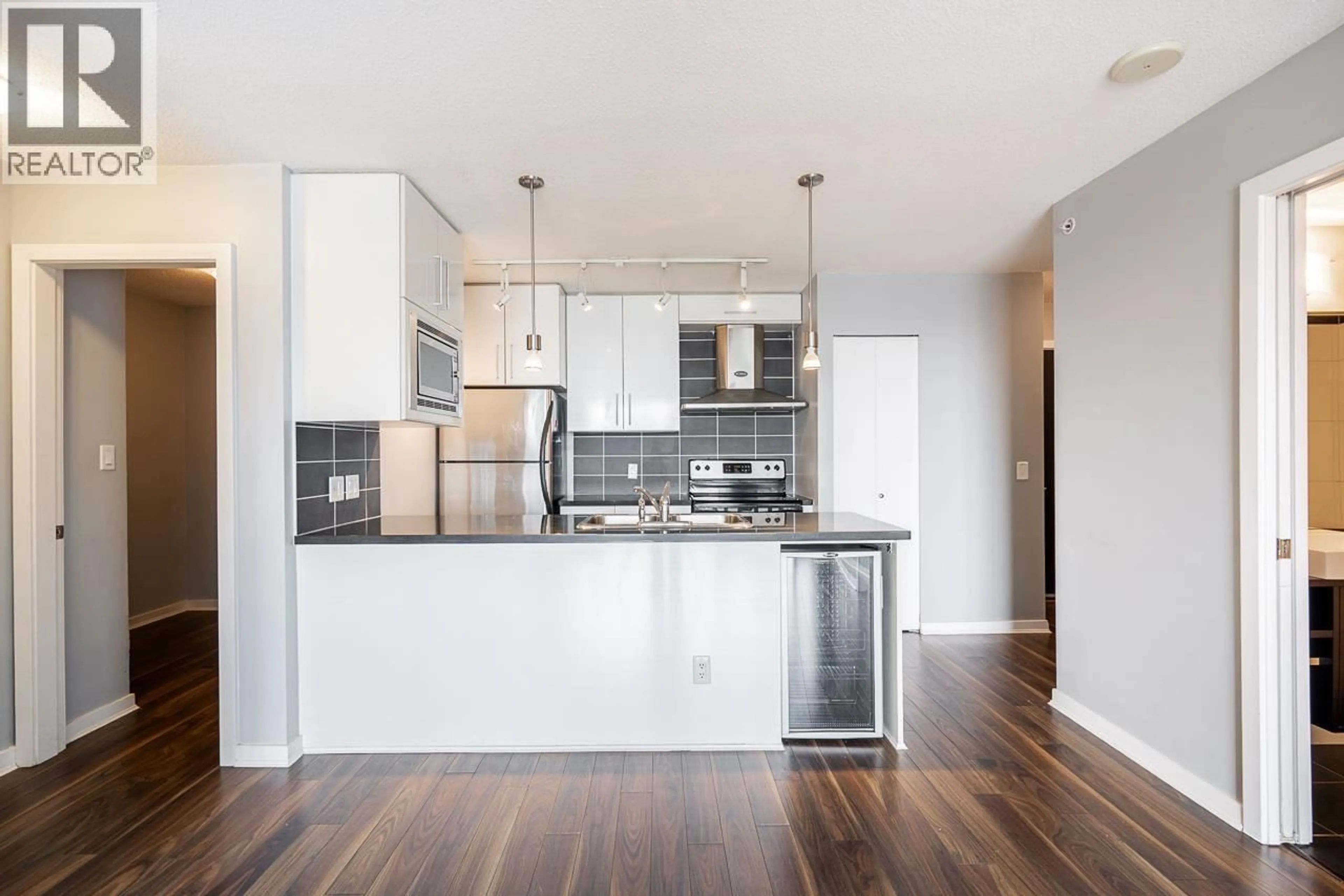 Open concept kitchen, wood/laminate floor for 1203 - 689 ABBOTT STREET, Vancouver British Columbia V6B0J2