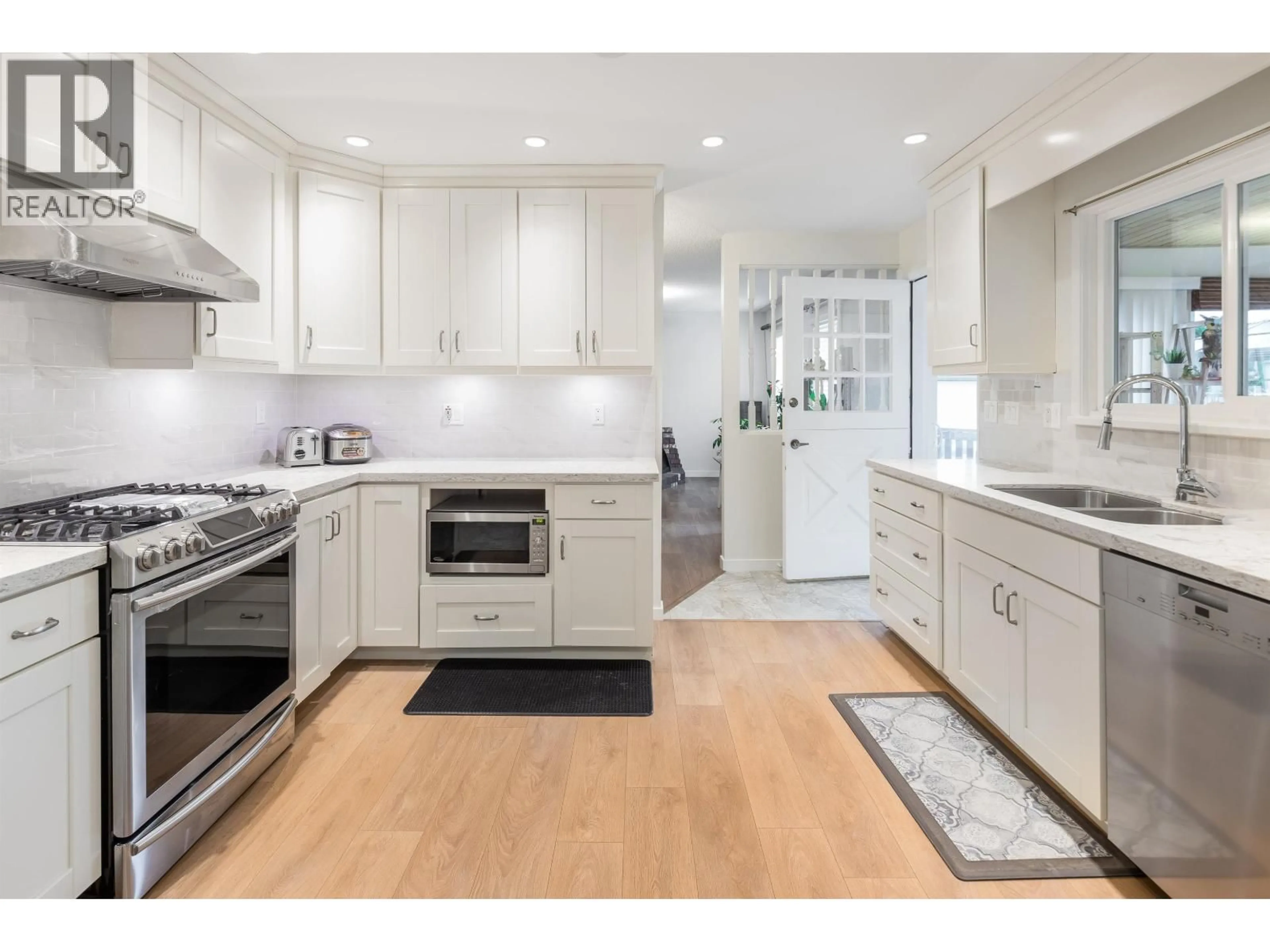 Open concept kitchen, unknown for 7720 NO.1 ROAD, Richmond British Columbia V7C1T6