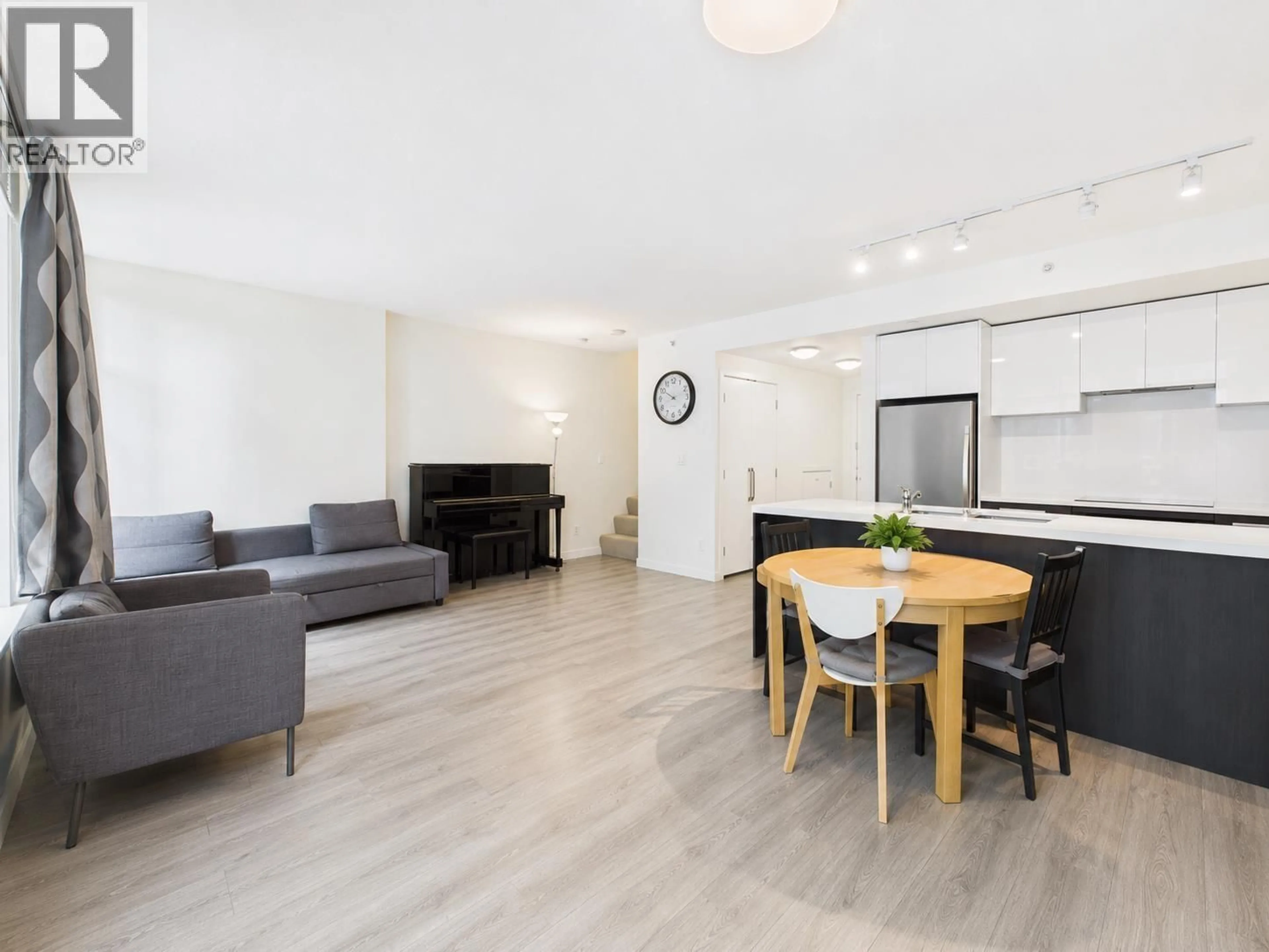 Living room with furniture, wood/laminate floor for 6335 SILVER AVENUE, Burnaby British Columbia V5H0C3