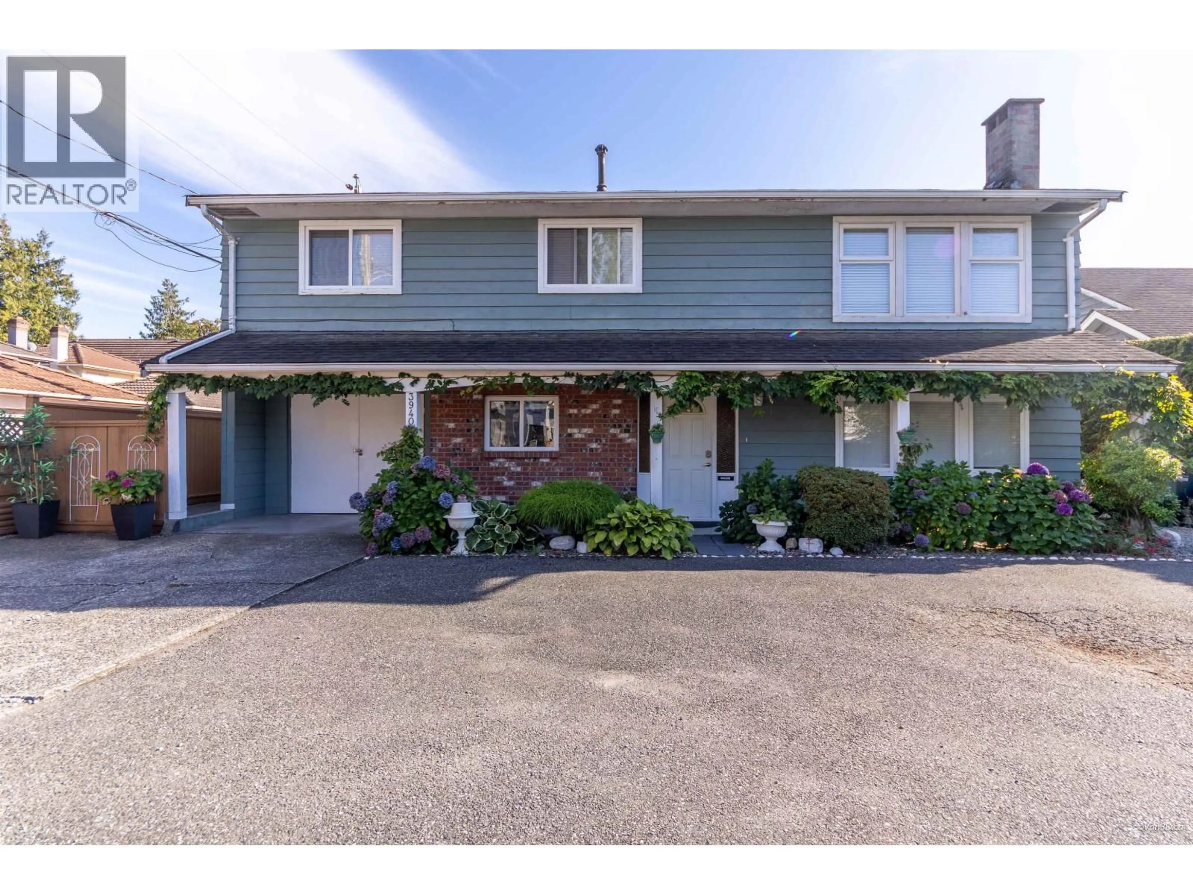 Home with vinyl exterior material, street for 3940 WILLIAMS ROAD, Richmond British Columbia V7E1J6