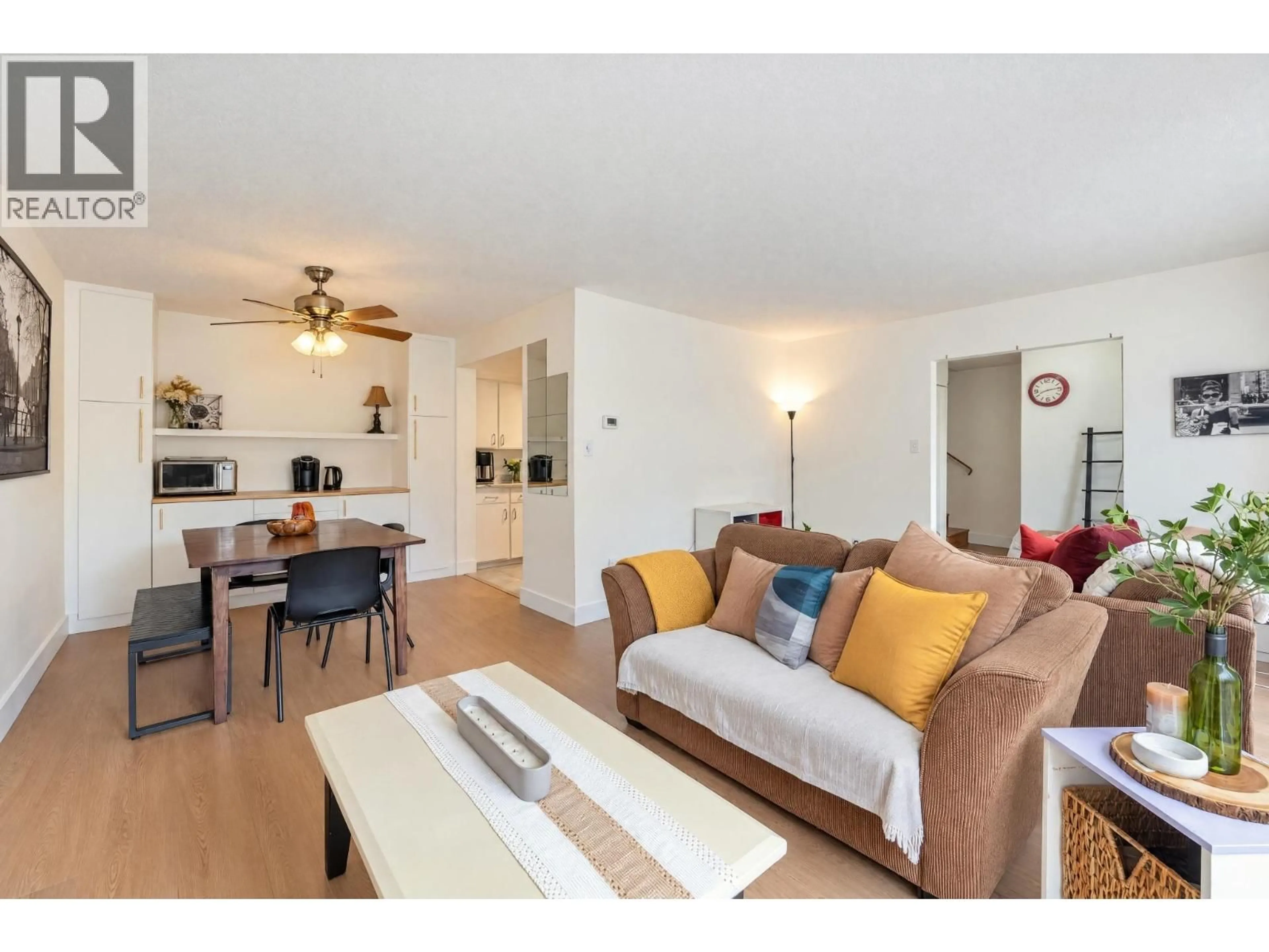 Living room with furniture, wood/laminate floor for 8865 HORNE STREET, Burnaby British Columbia V3N4J8