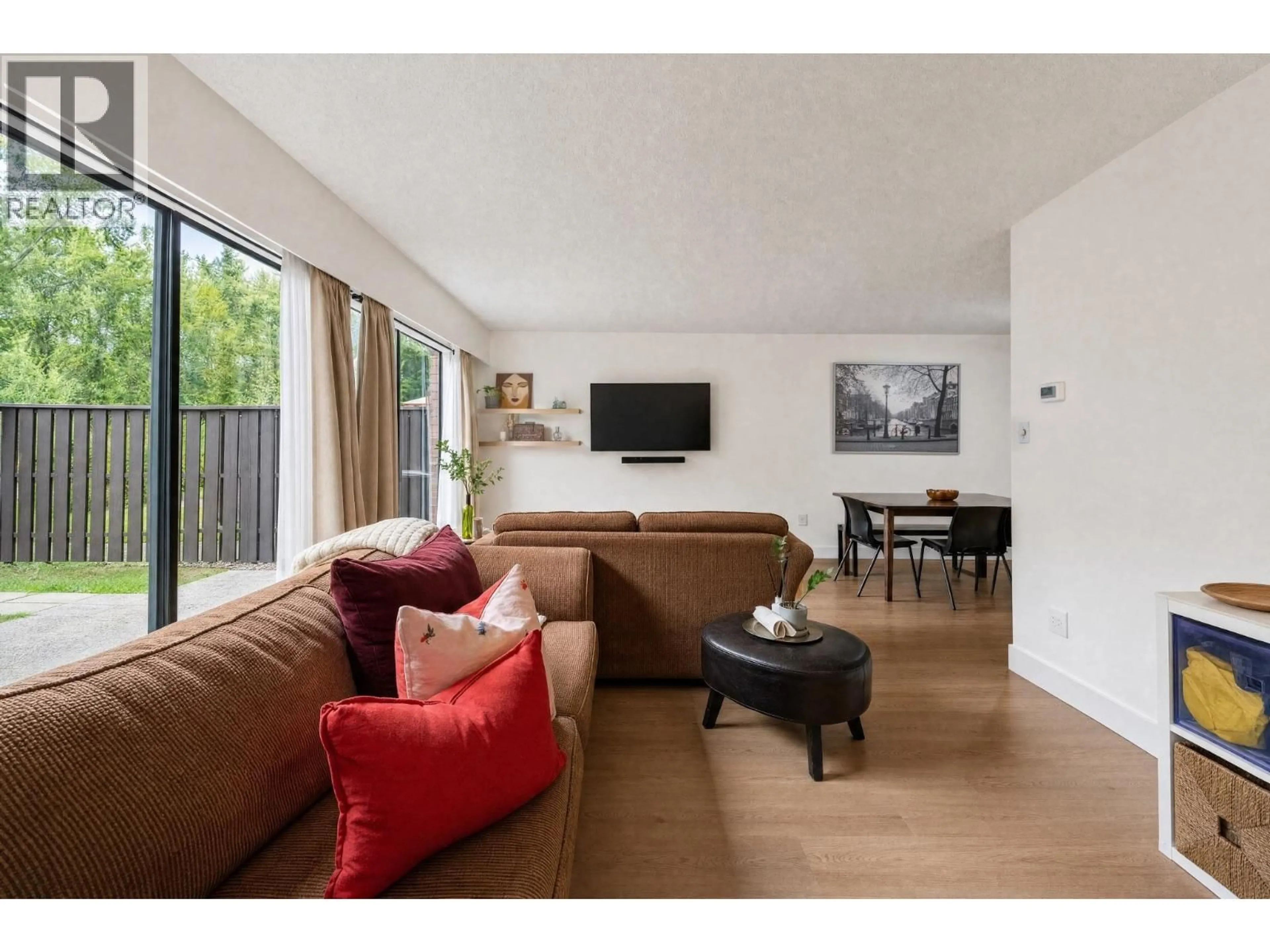 Living room with furniture, wood/laminate floor for 8865 HORNE STREET, Burnaby British Columbia V3N4J8