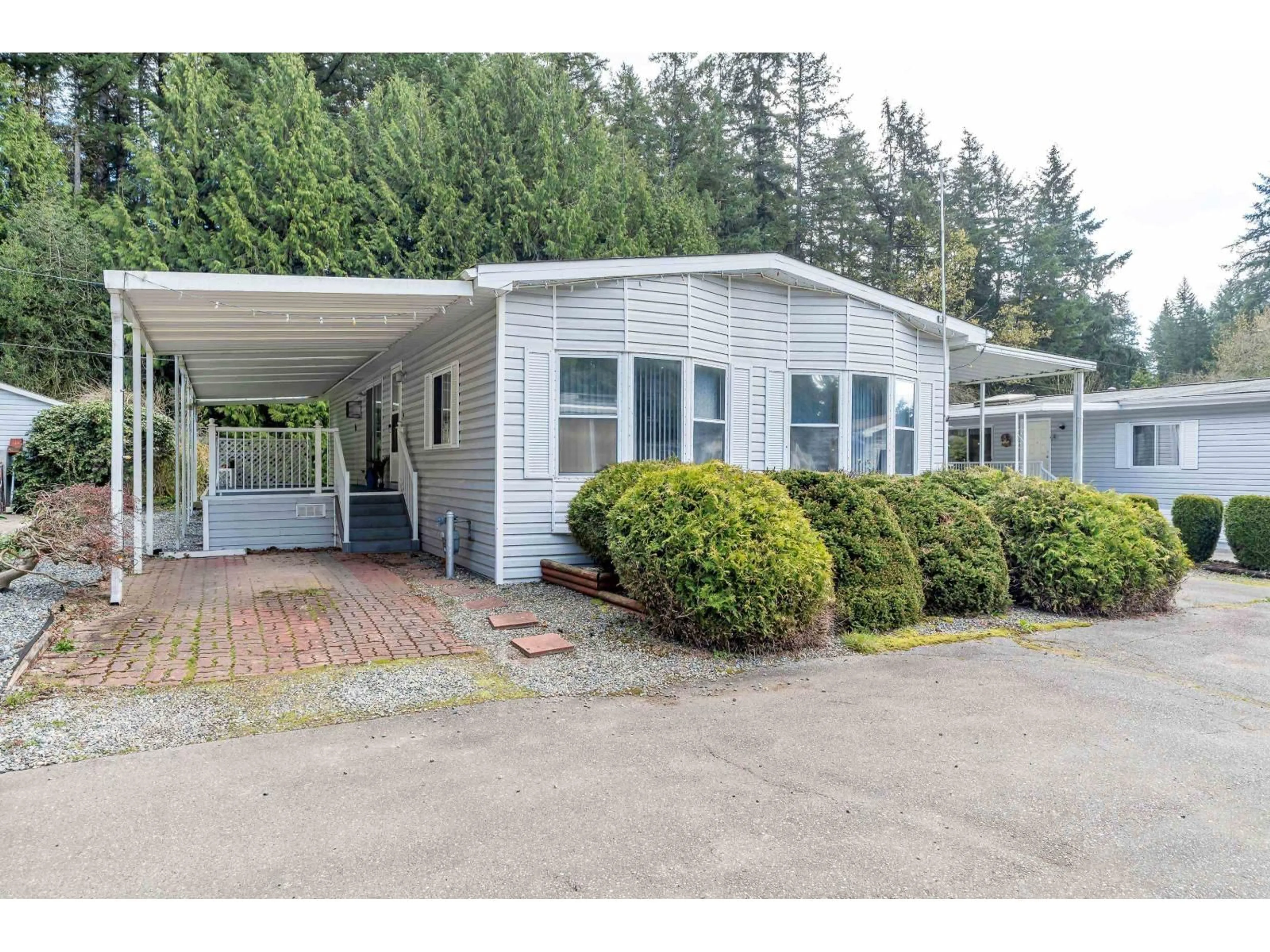 Home with vinyl exterior material, street for 242 - 20071 24 AVENUE, Langley British Columbia V2Z2A1