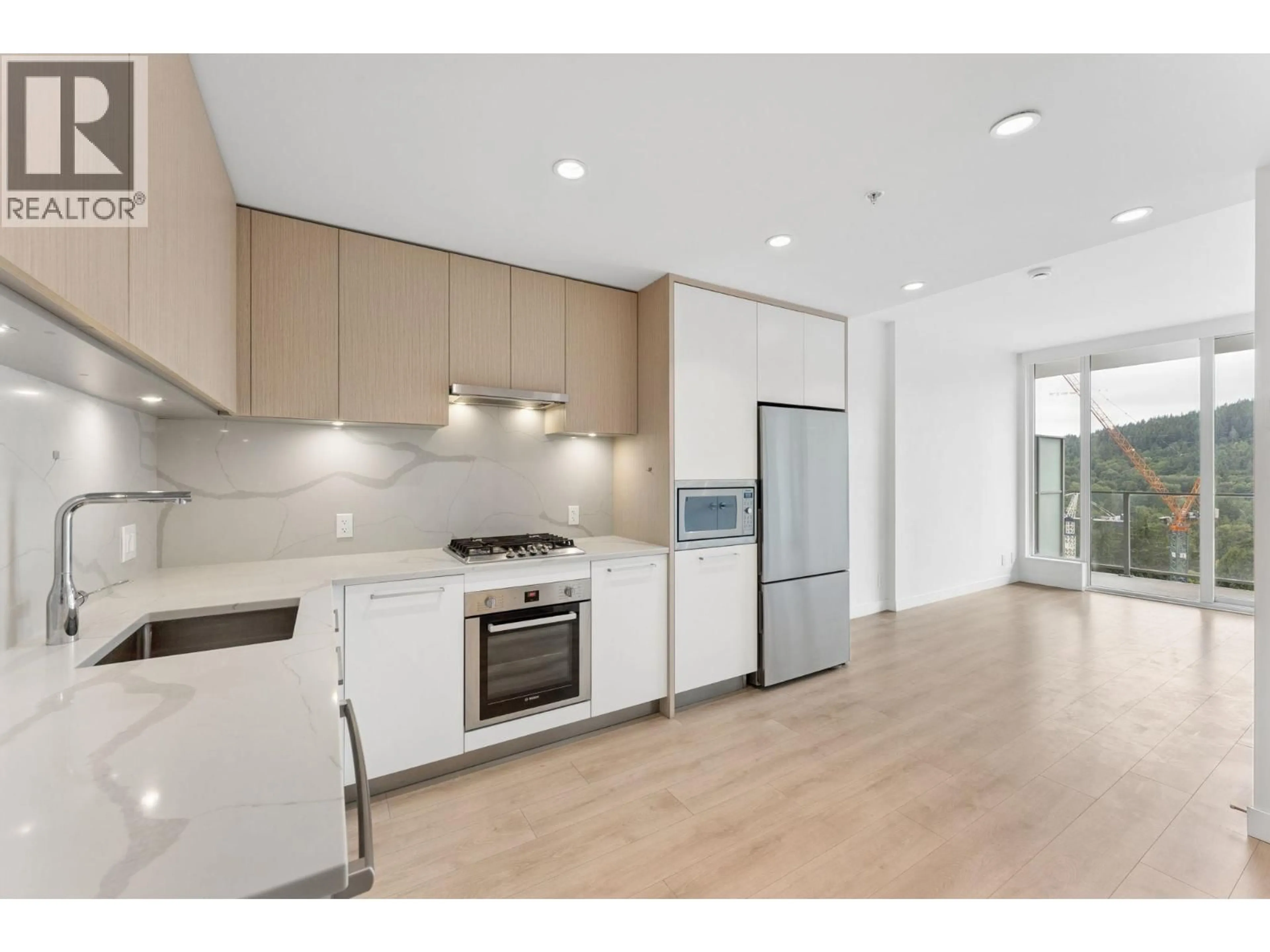 Open concept kitchen, unknown for 903 - 567 CLARKE ROAD, Coquitlam British Columbia V3J0K7