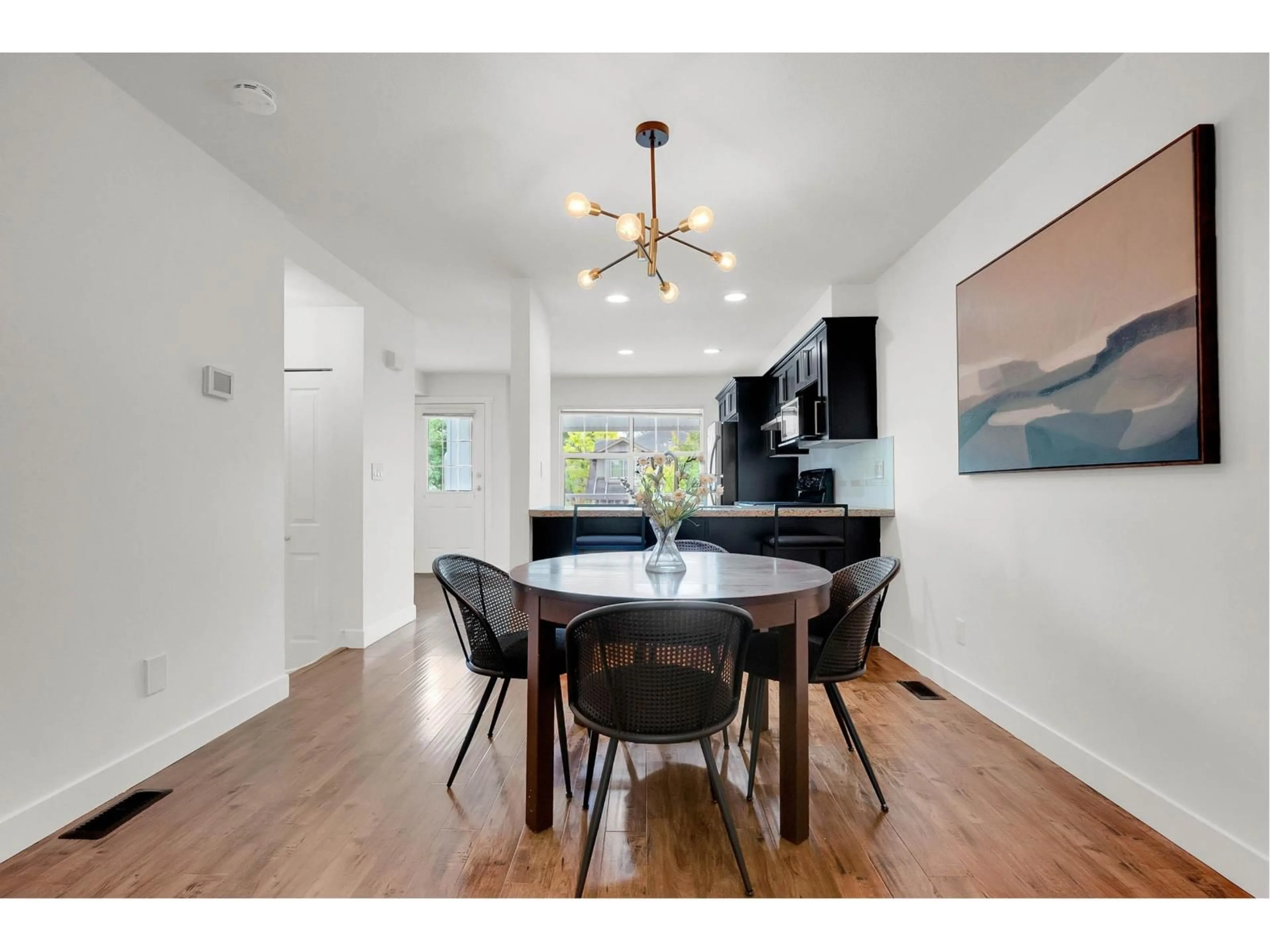 Dining room, wood/laminate floor for 11 - 6555 192A STREET, Surrey British Columbia V4N0A2