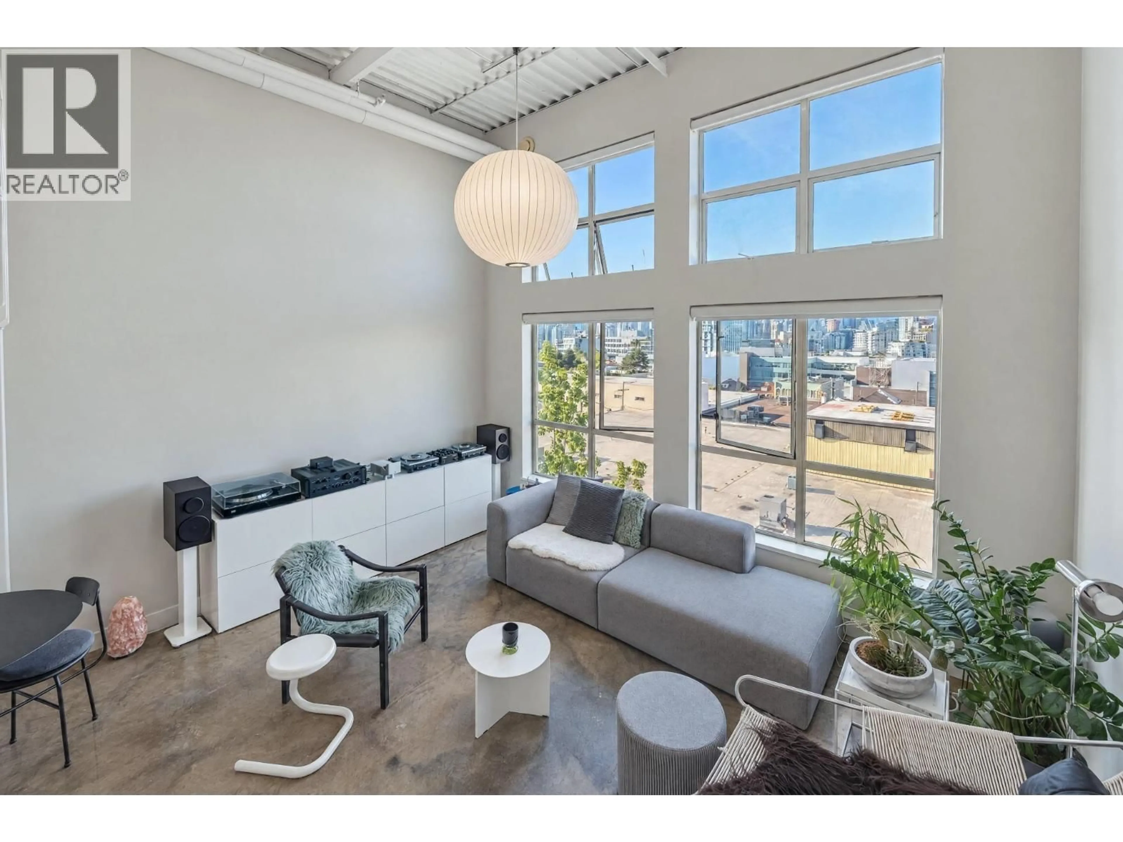 Living room with furniture, unknown for 402 - 338 8TH AVENUE, Vancouver British Columbia V5Y3X2