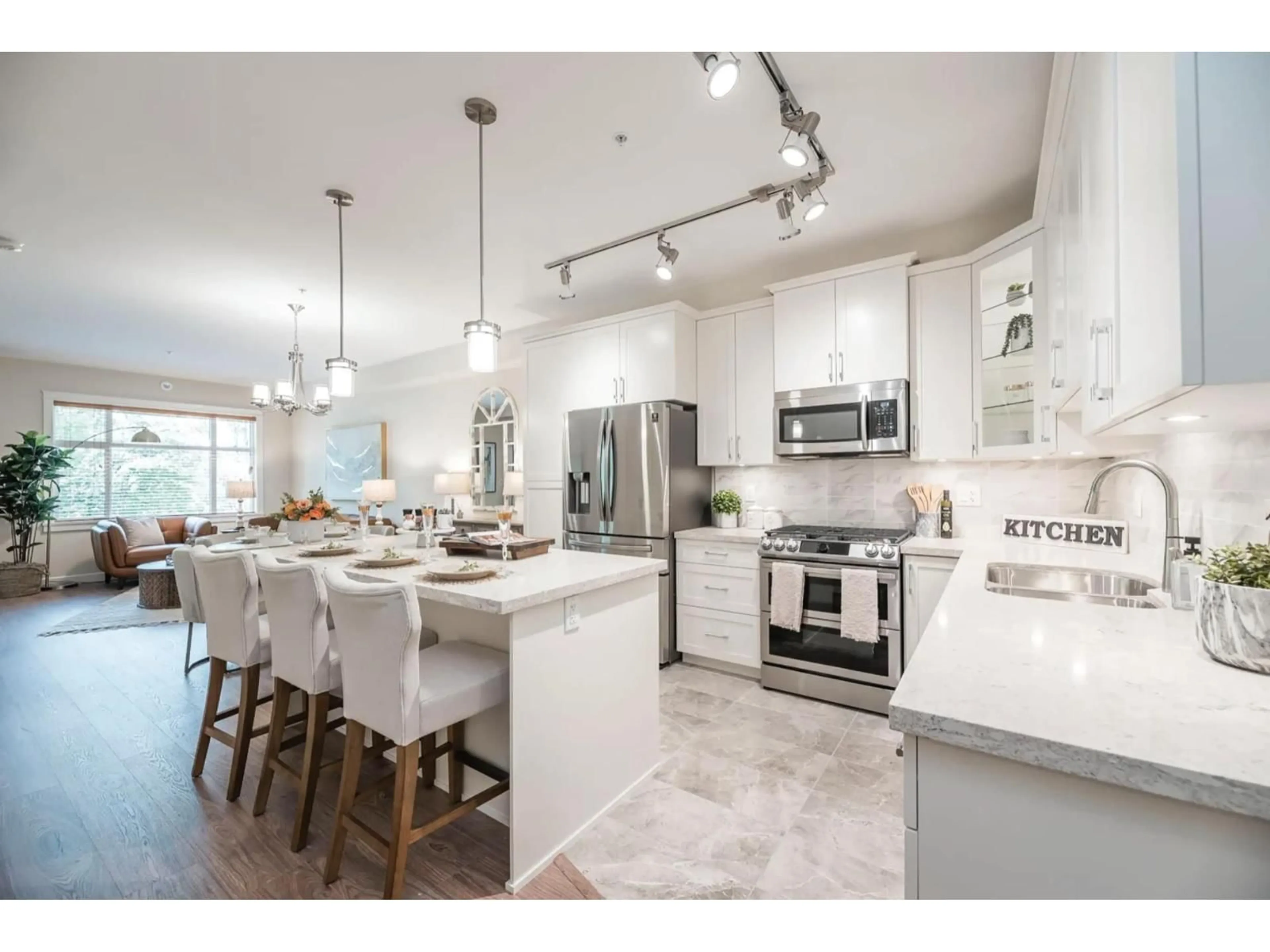 Open concept kitchen, ceramic/tile floor for 205 - 11035 RAVINE ROAD, Surrey British Columbia V3T3X5