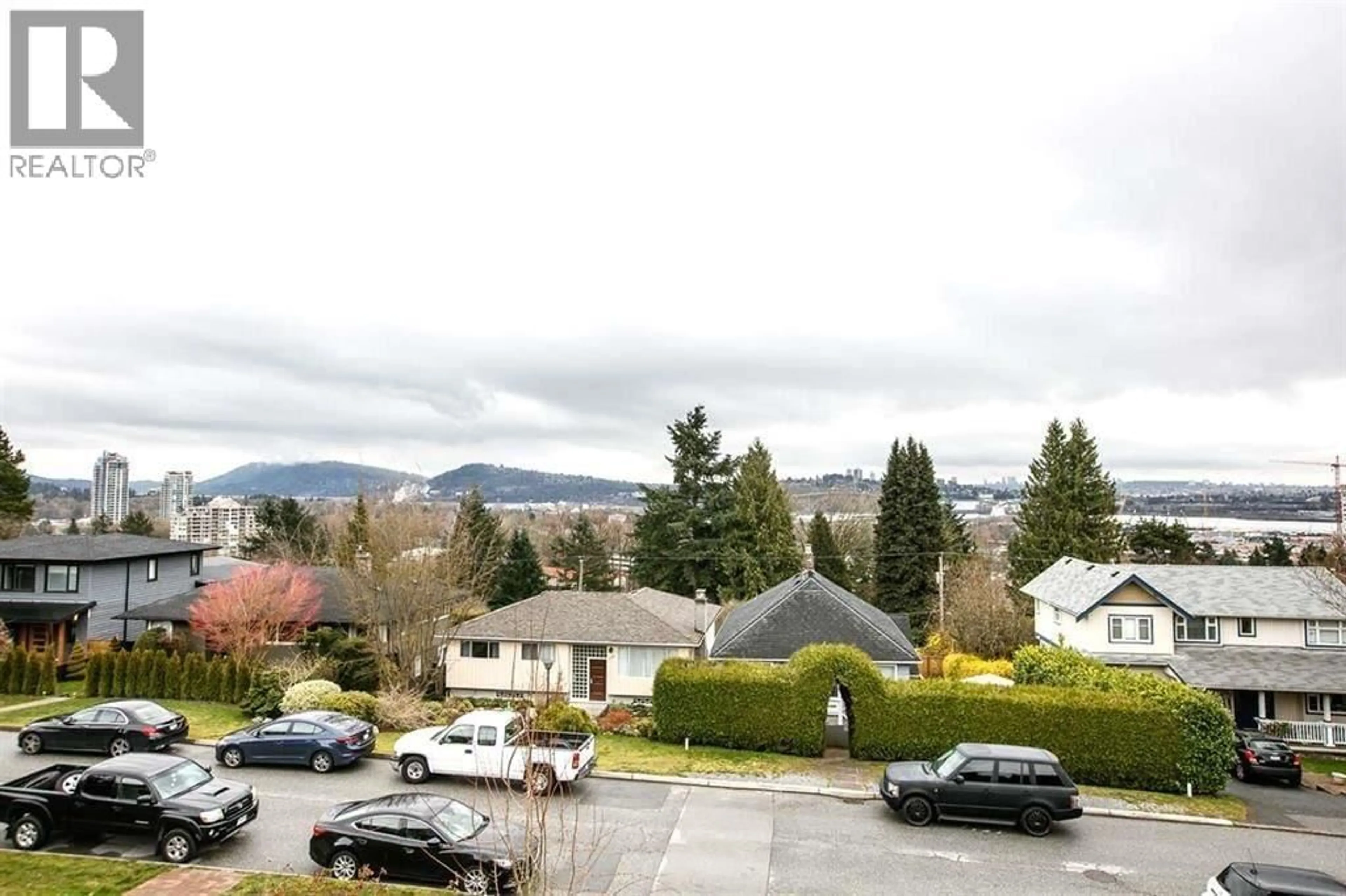 A pic from outside/outdoor area/front of a property/back of a property/a pic from drone, mountain view for 1132 CLOVERLEY STREET, North Vancouver British Columbia V7L1N6