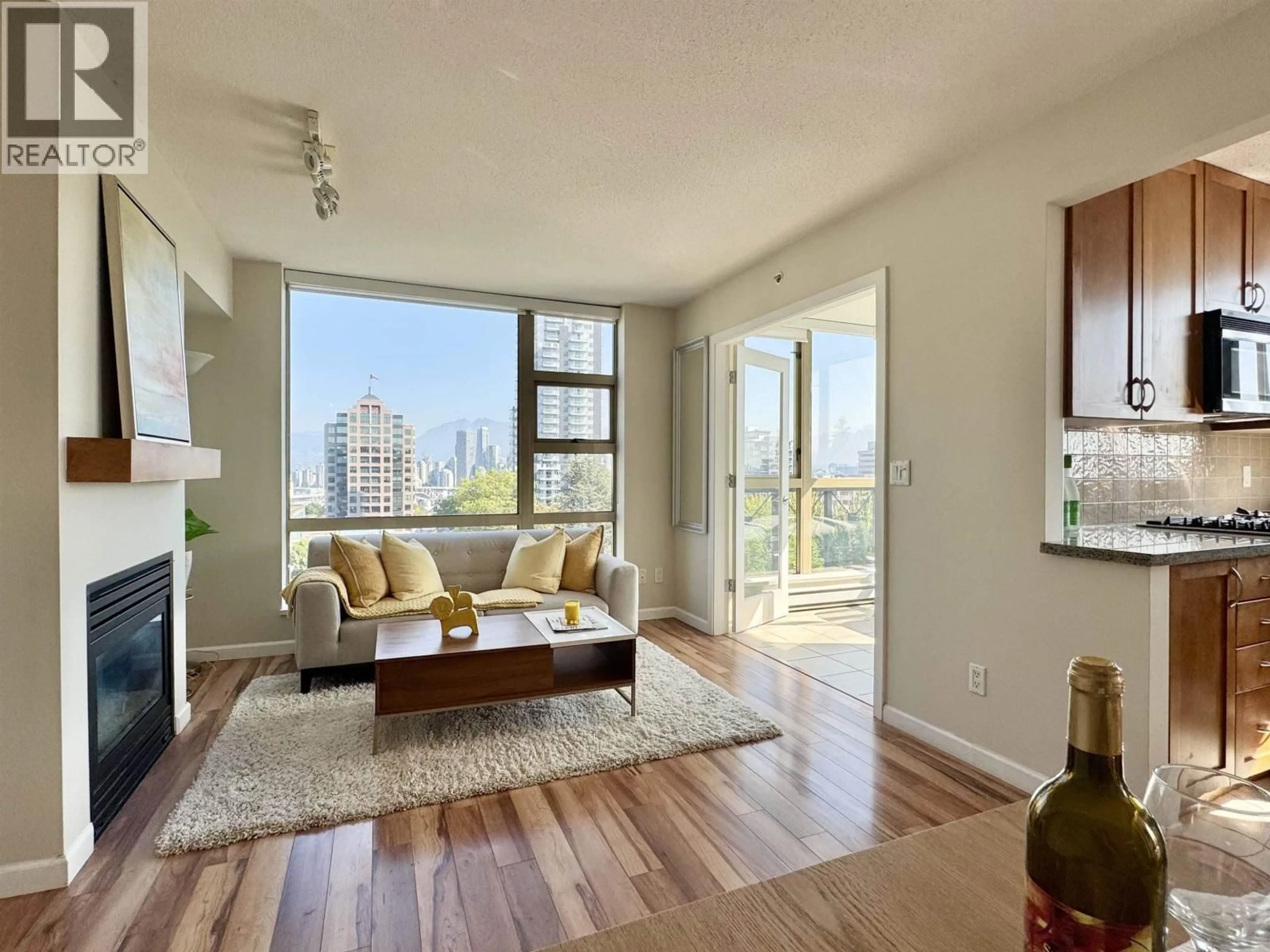 Living room with furniture, wood/laminate floor for 905 - 1316 11TH AVENUE, Vancouver British Columbia V6H4G8