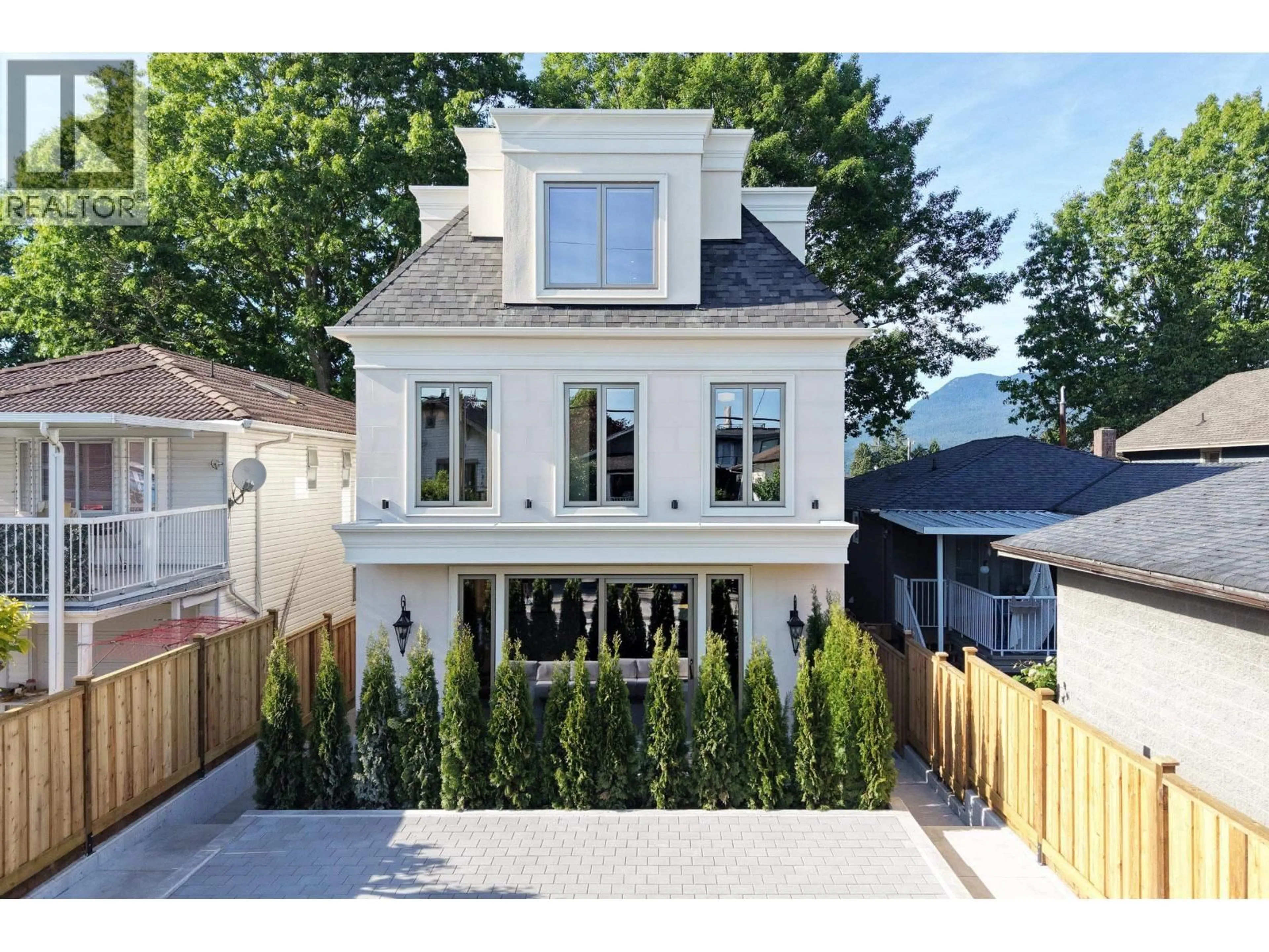 Home with brick exterior material, street for 2 - 4136 CAMBRIDGE STREET, Burnaby British Columbia V5C1G9