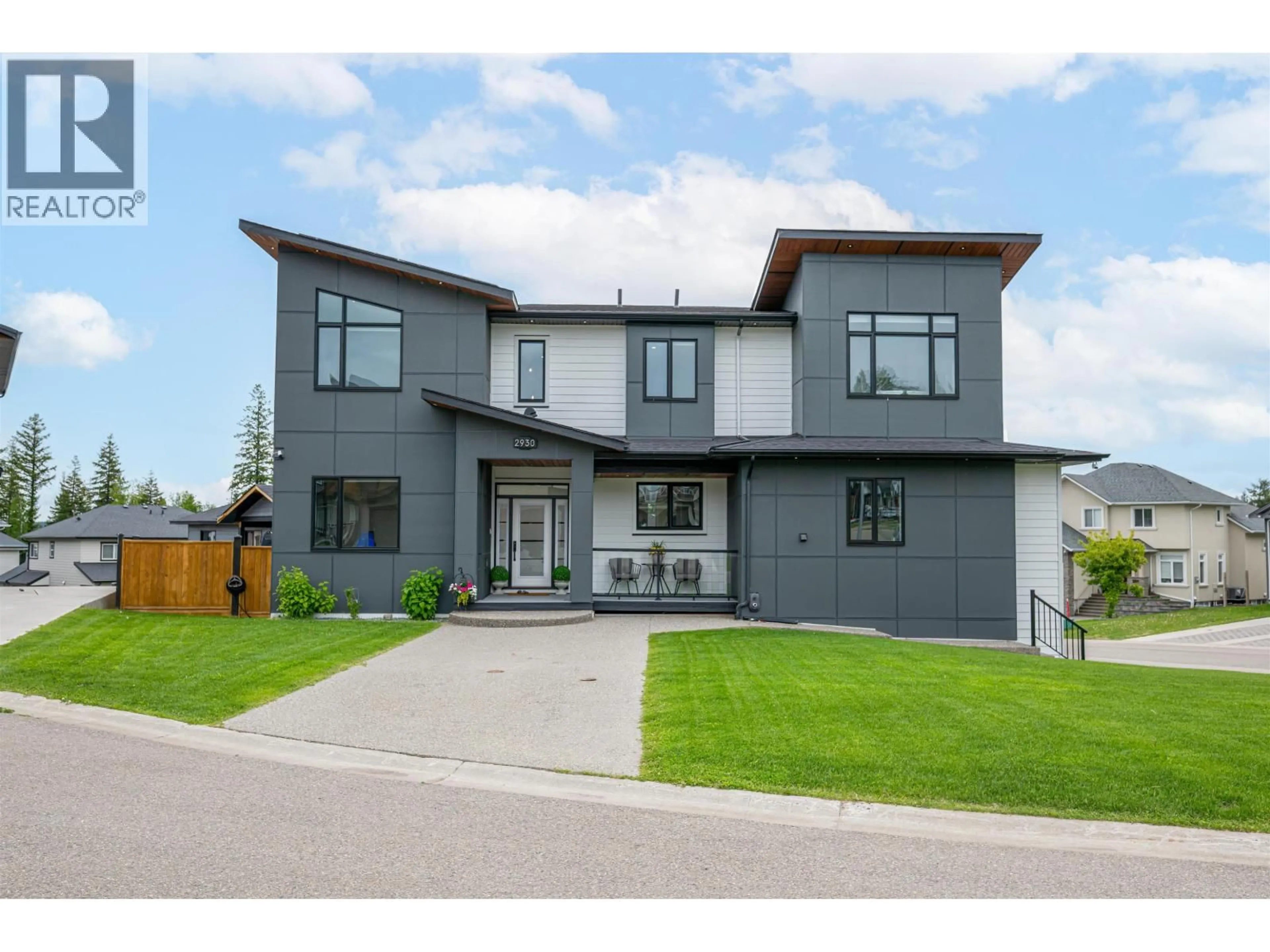 Home with brick exterior material, street for 2930 ELLINGTON COURT, Prince George British Columbia V2N0G3