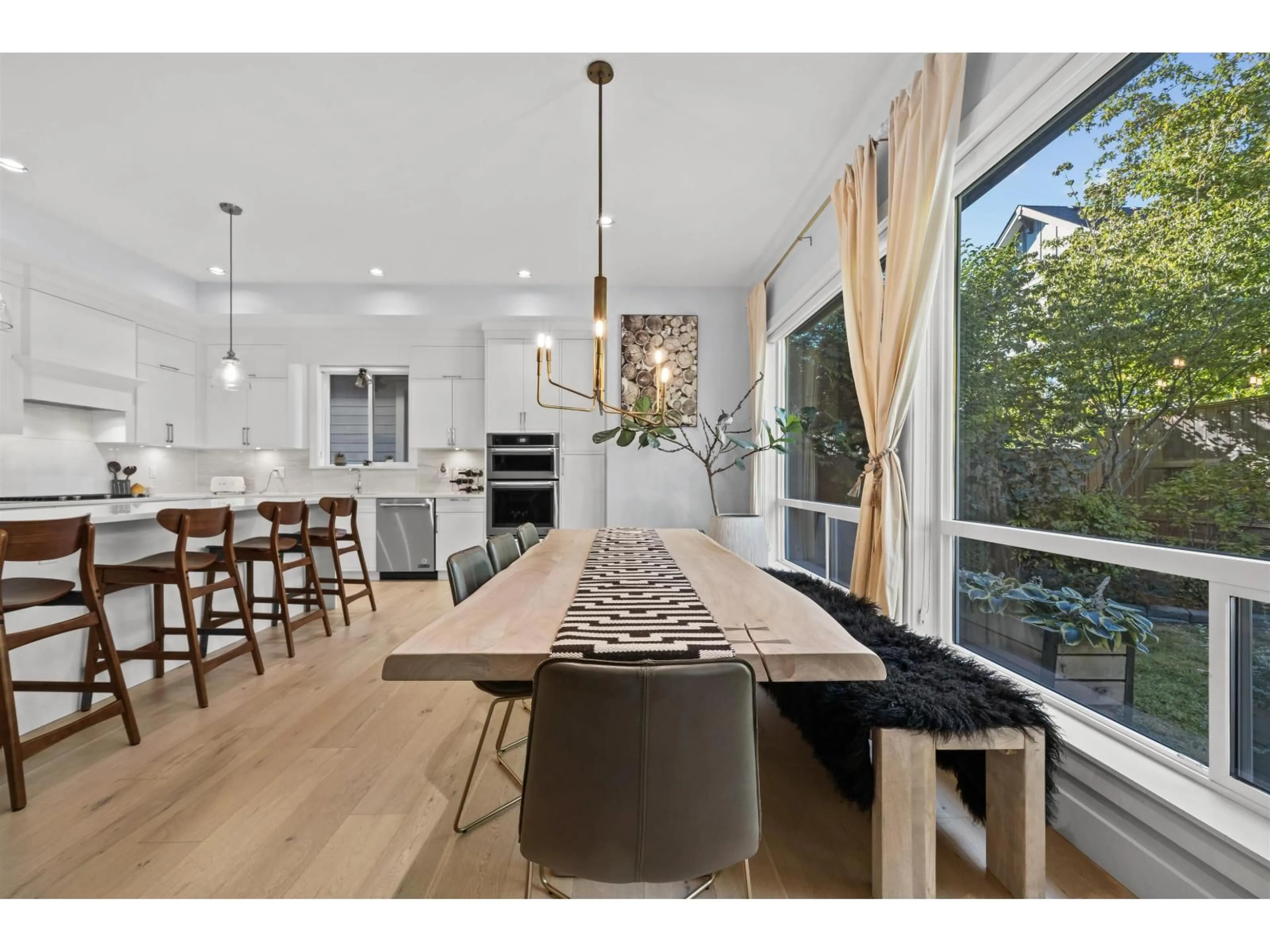 Open concept kitchen, wood/laminate floor for 16735 17A AVENUE, Surrey British Columbia V3Z0T3