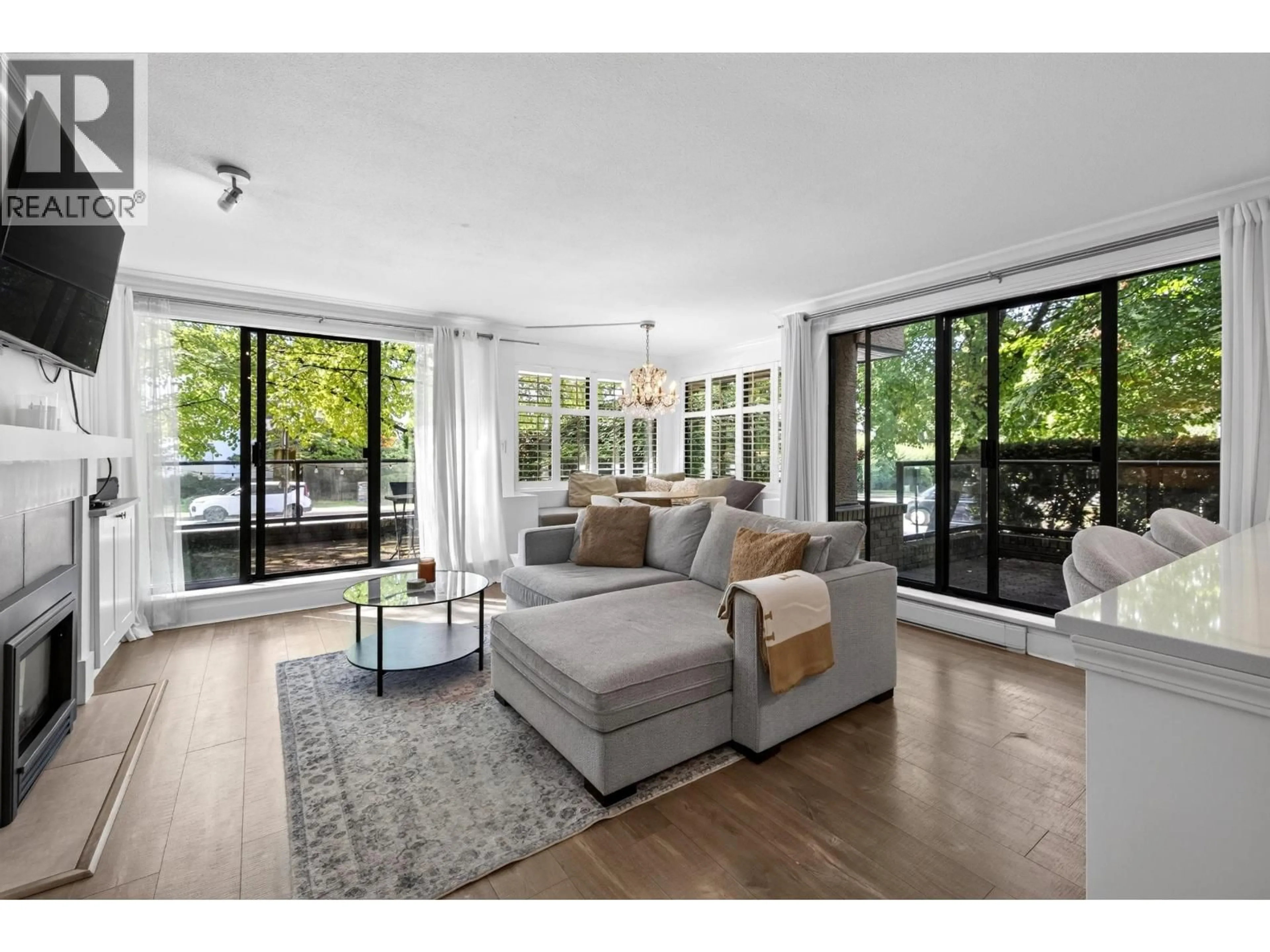 Living room with furniture, unknown for 101 - 1702 CHESTERFIELD AVENUE, North Vancouver British Columbia V7M2P1