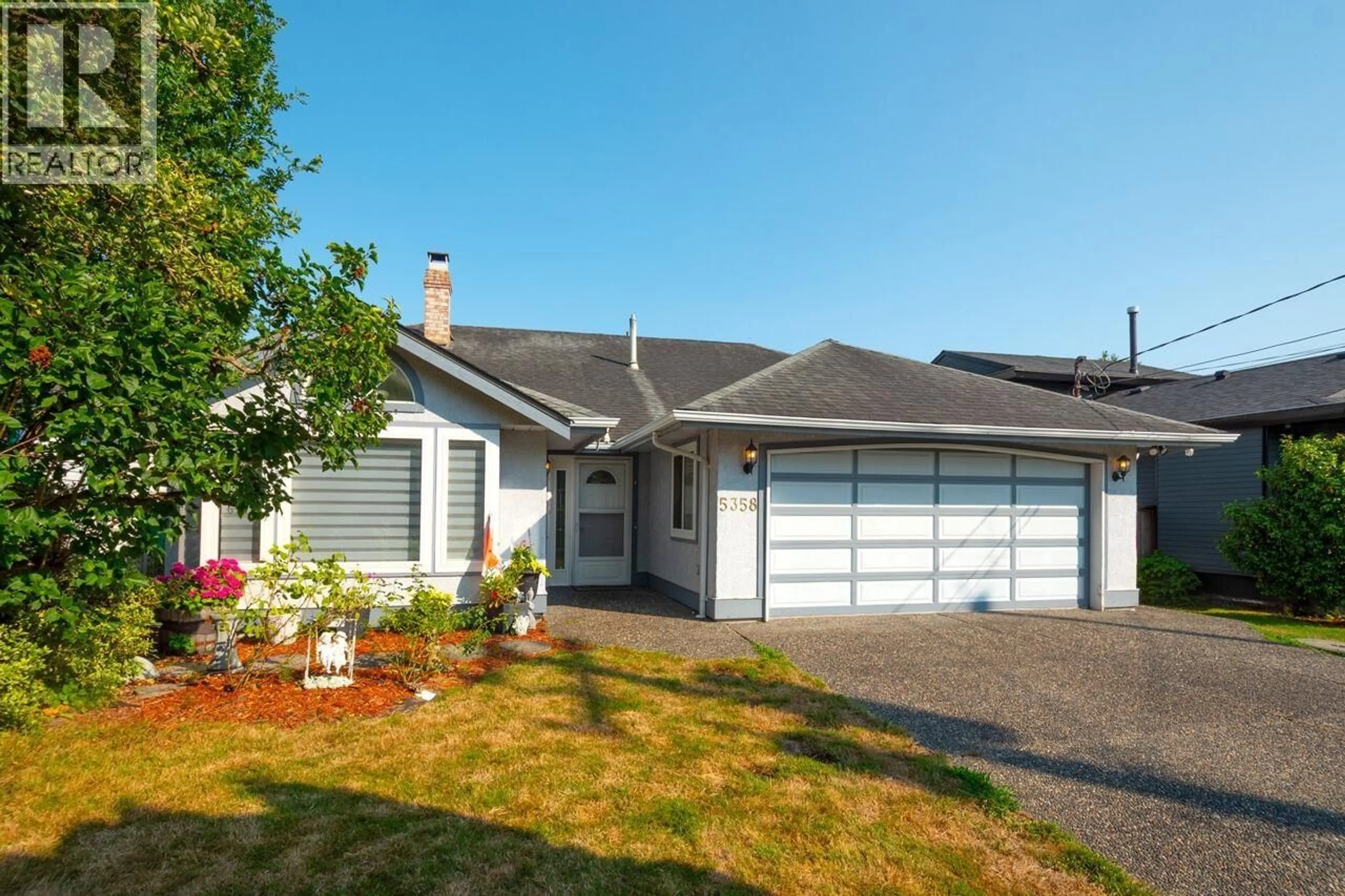 Home with vinyl exterior material, street for 5358 WESTMINSTER AVENUE, Delta British Columbia V4K2J2