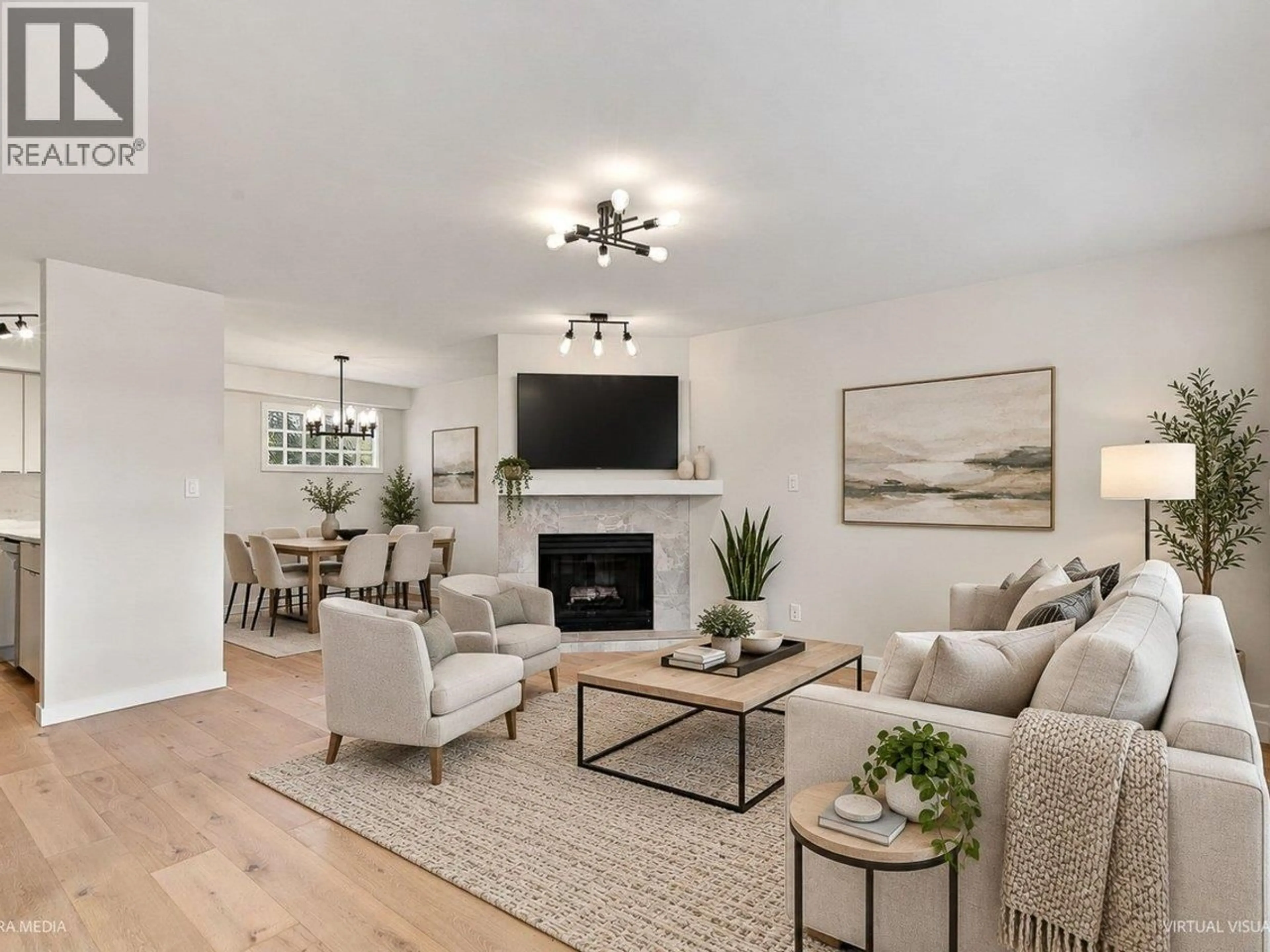 Living room with furniture, unknown for 203 - 3787 PENDER STREET, Burnaby British Columbia V5C2L2