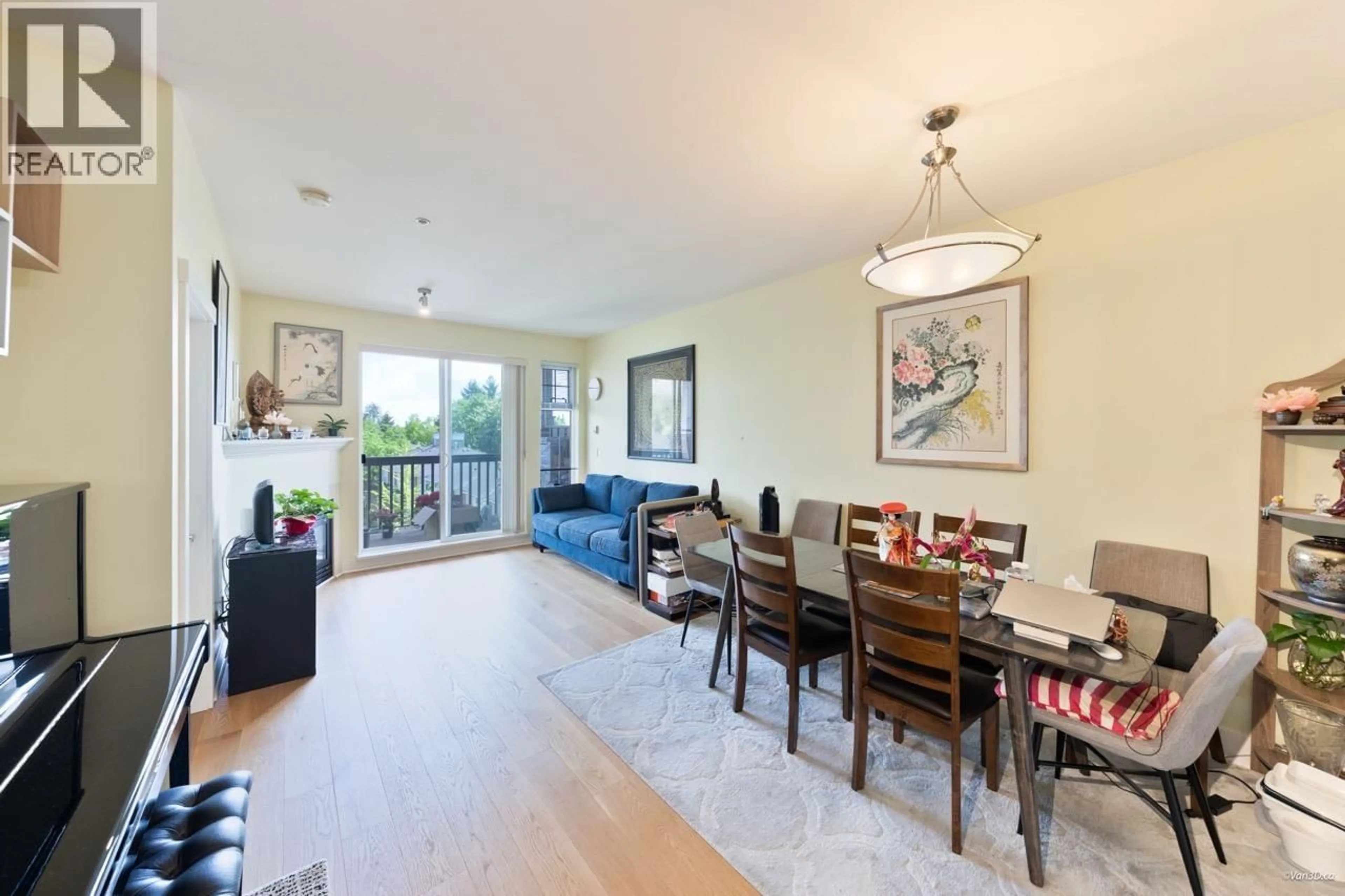 Dining room, wood/laminate floor for 408 - 995 59TH AVENUE, Vancouver British Columbia V6P6Z2