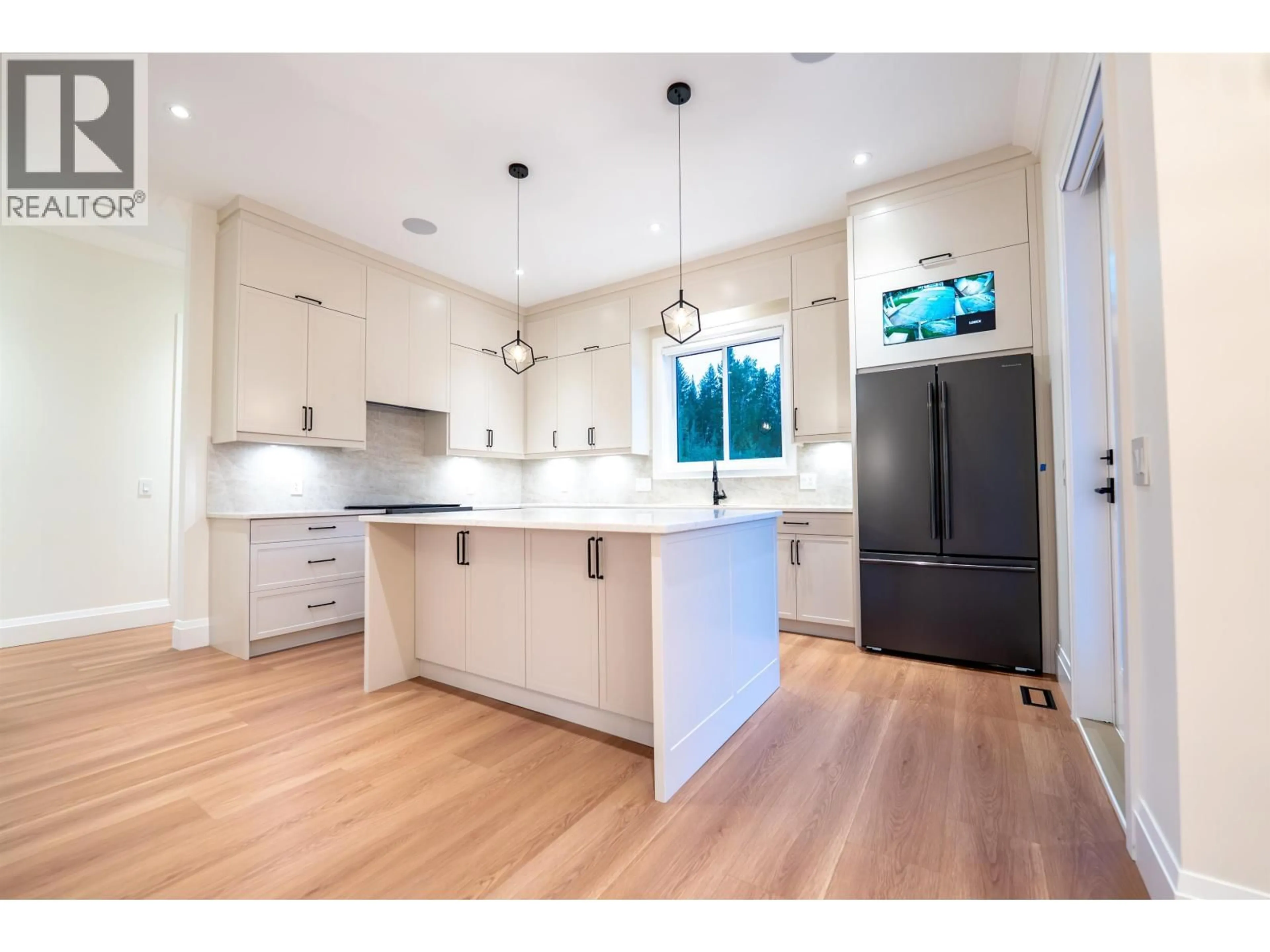 Open concept kitchen, unknown for 335 - 4393 COWART ROAD, Prince George British Columbia V2N6H9