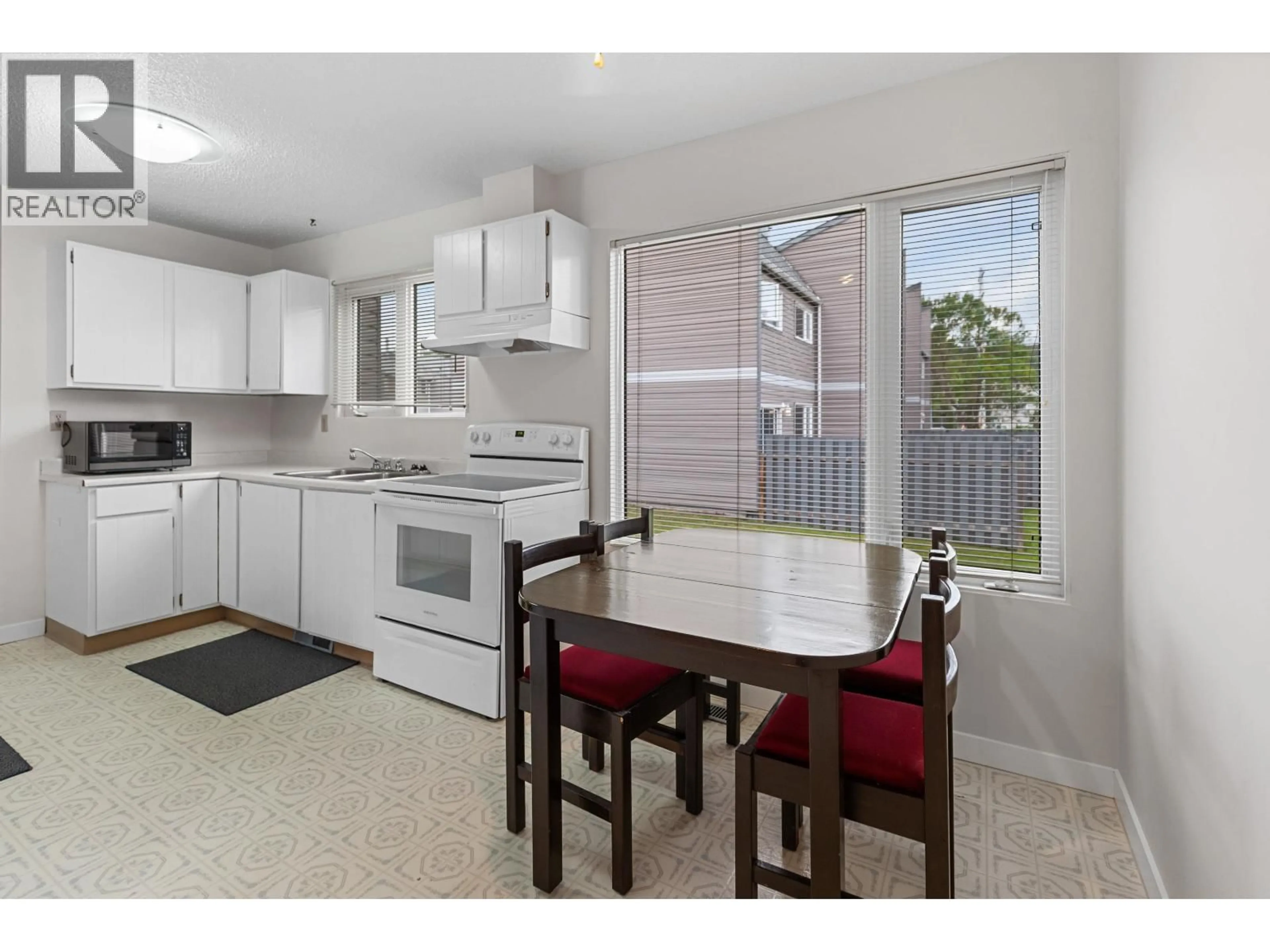Standard kitchen, wood/laminate floor for 305 - 2550 OSPIKA BOULEVARD, Prince George British Columbia V2N3T2
