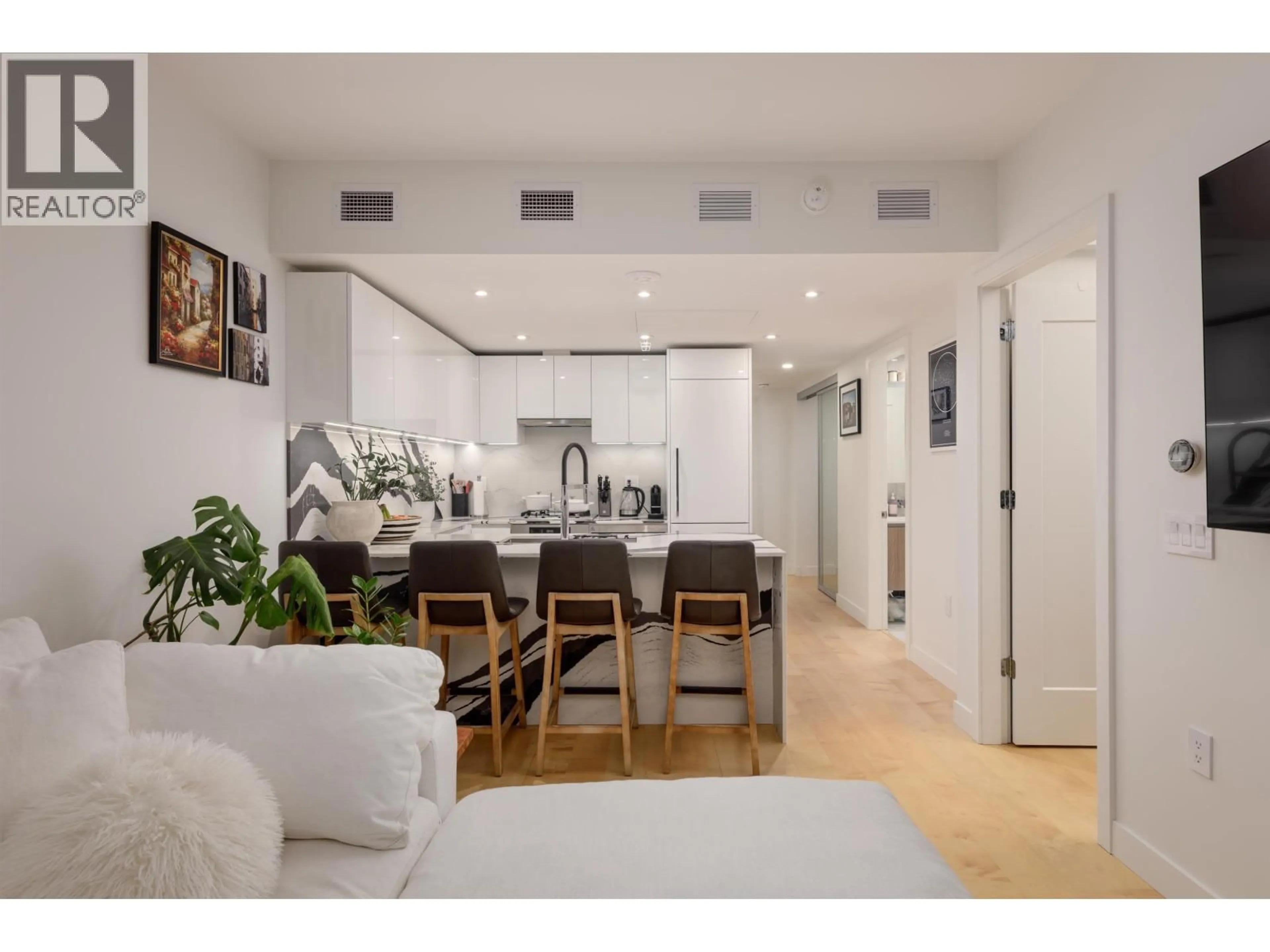 Open concept kitchen, unknown for 1005 - 135 13TH STREET, North Vancouver British Columbia V7L0J8