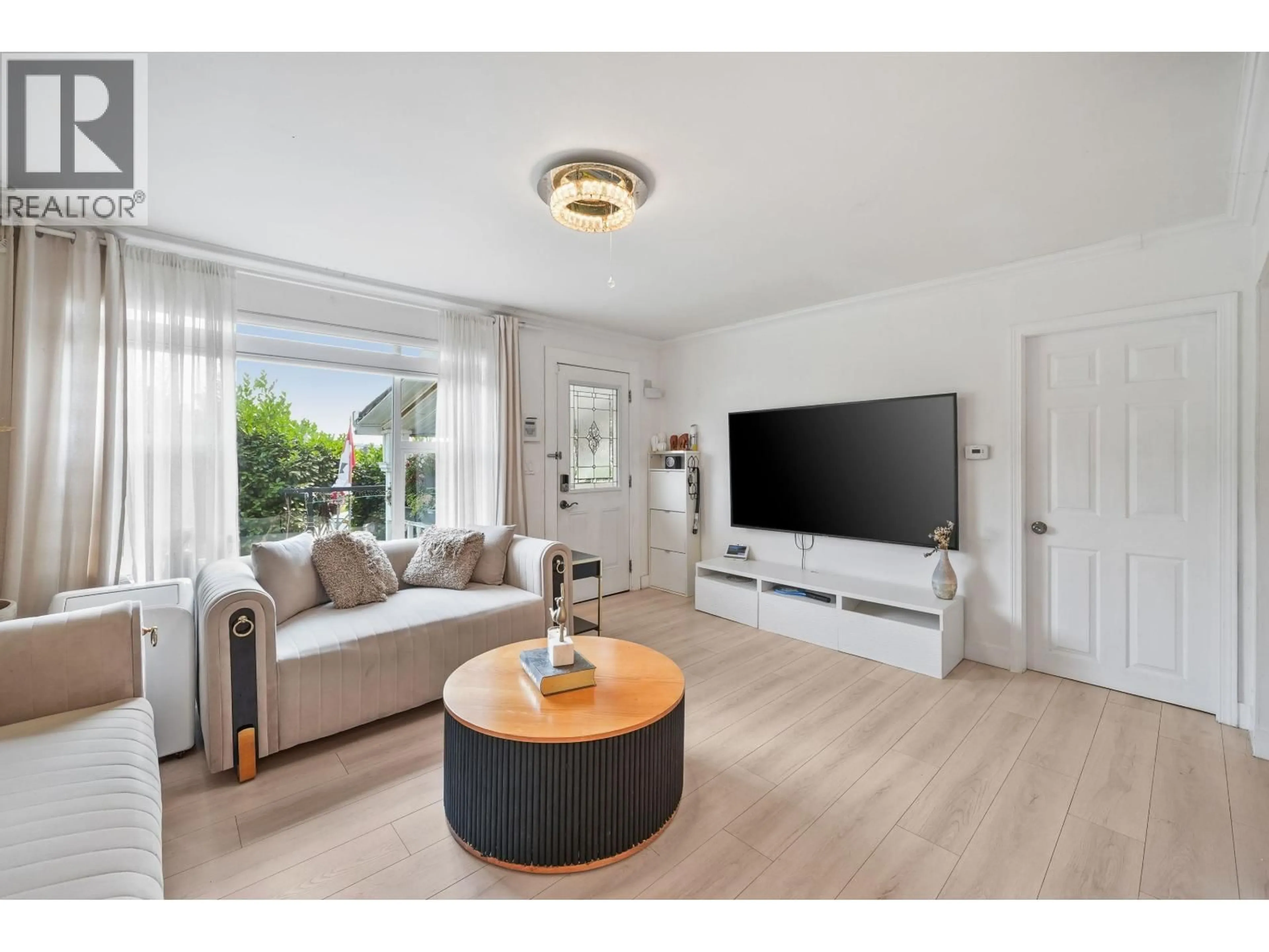 Living room with furniture, wood/laminate floor for 1875 COLEMAN AVENUE, Coquitlam British Columbia V3K1B5