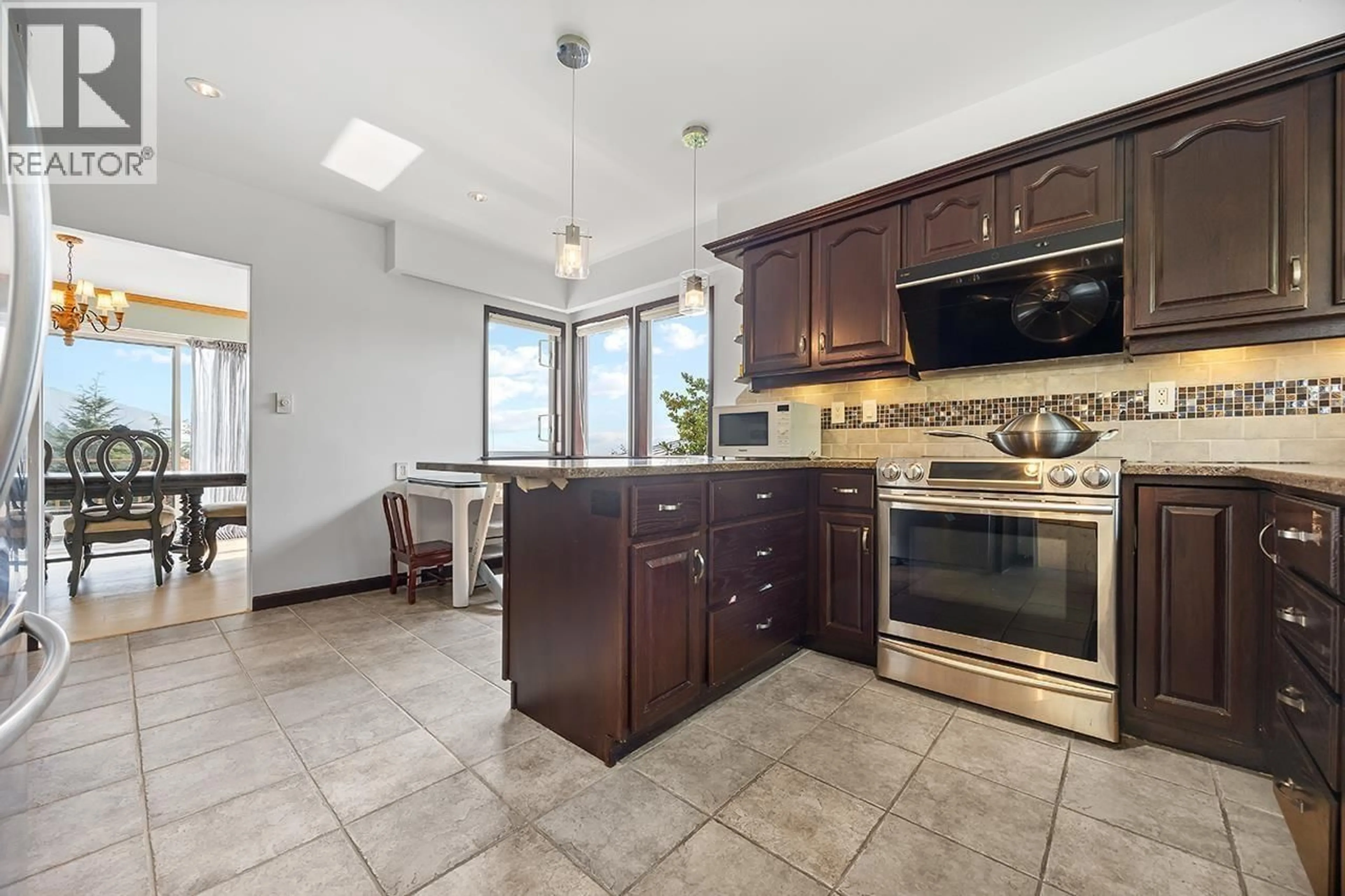 Open concept kitchen, ceramic/tile floor for 96 BONNYMUIR DRIVE, West Vancouver British Columbia V7S1L2