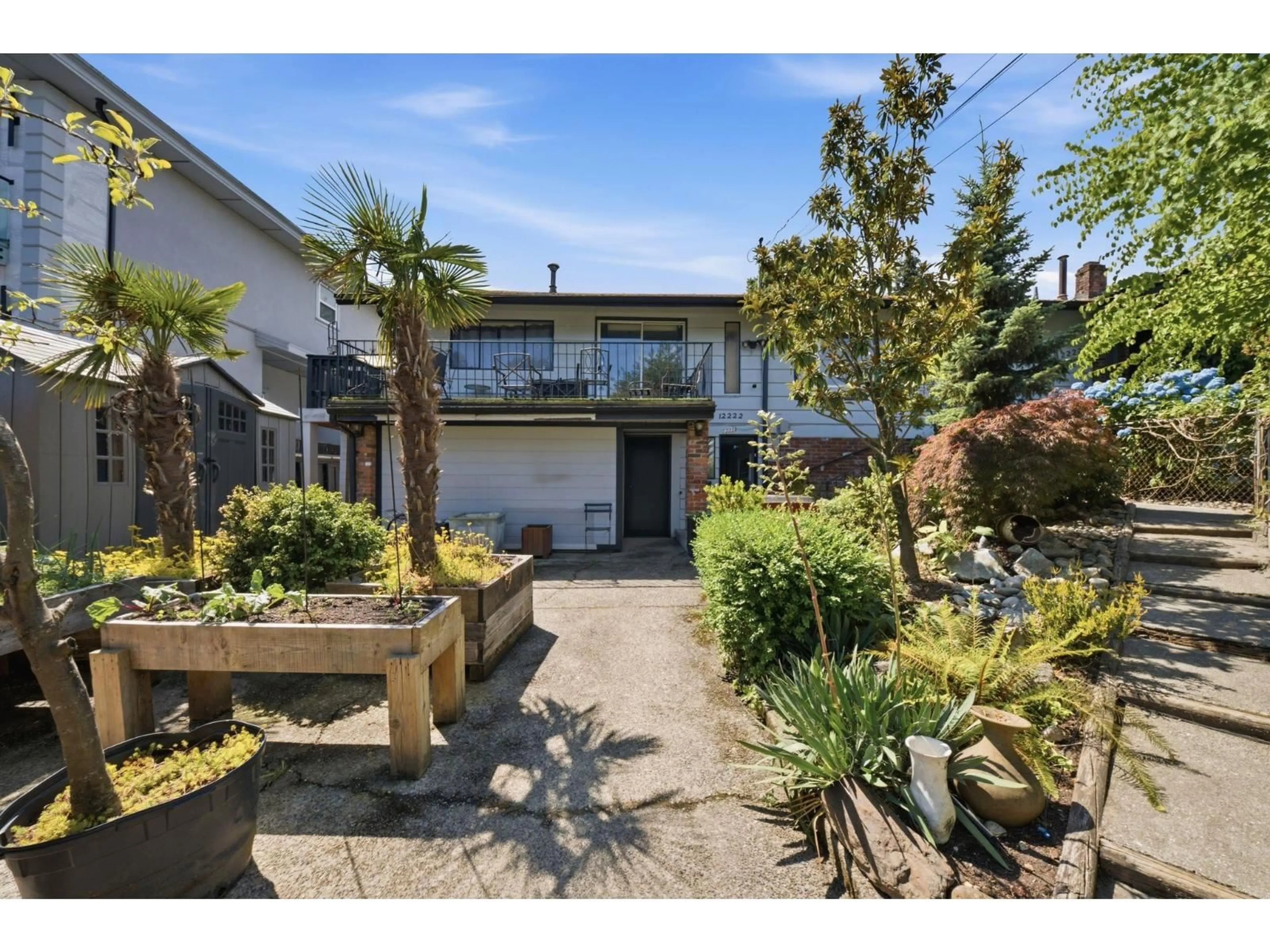 A pic from outside/outdoor area/front of a property/back of a property/a pic from drone, street for 12222 100 AVENUE, Surrey British Columbia V3V2X1