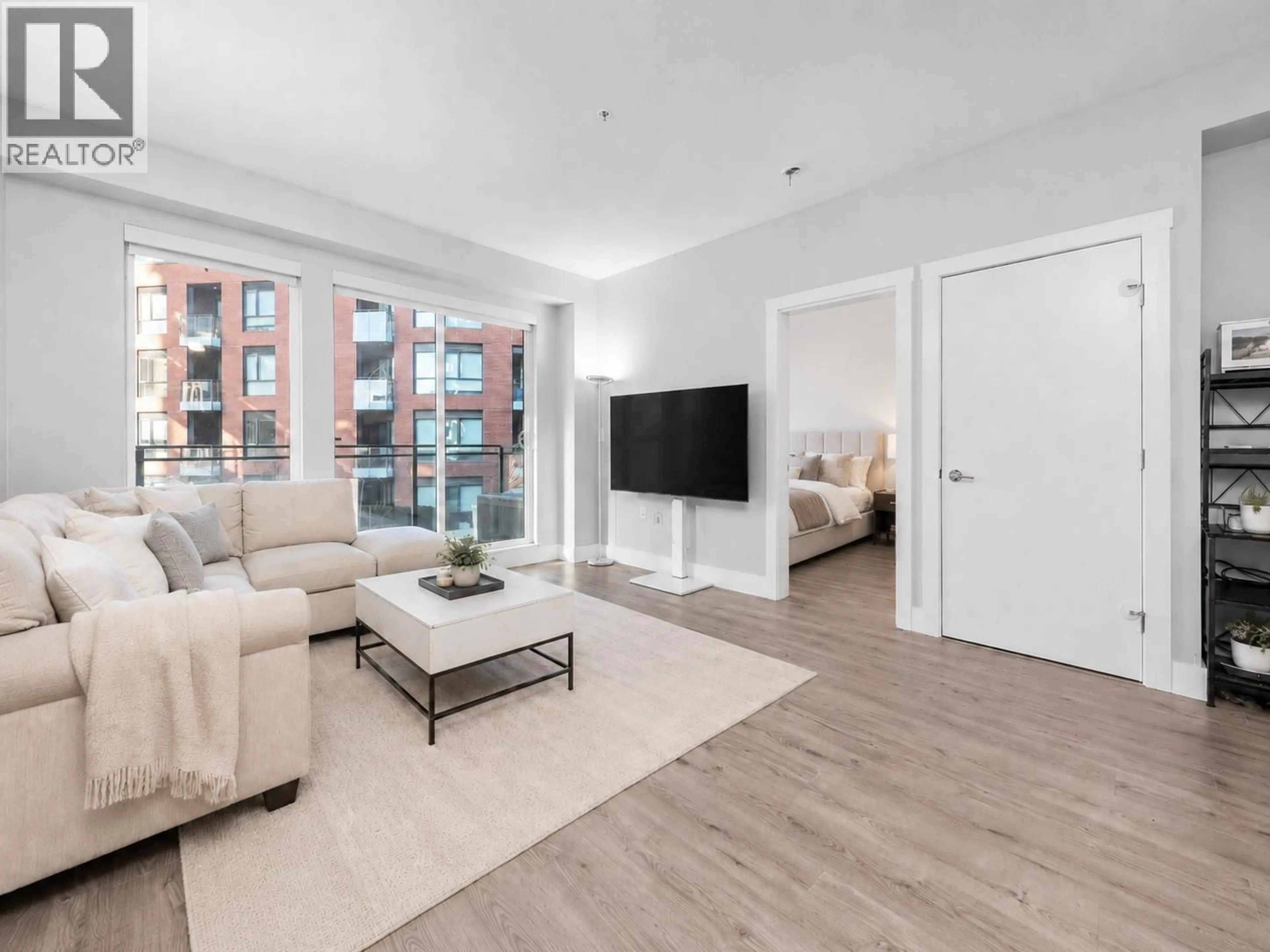 Living room with furniture, unknown for 309 - 3588 SAWMILL CRESCENT, Vancouver British Columbia V5S0H5
