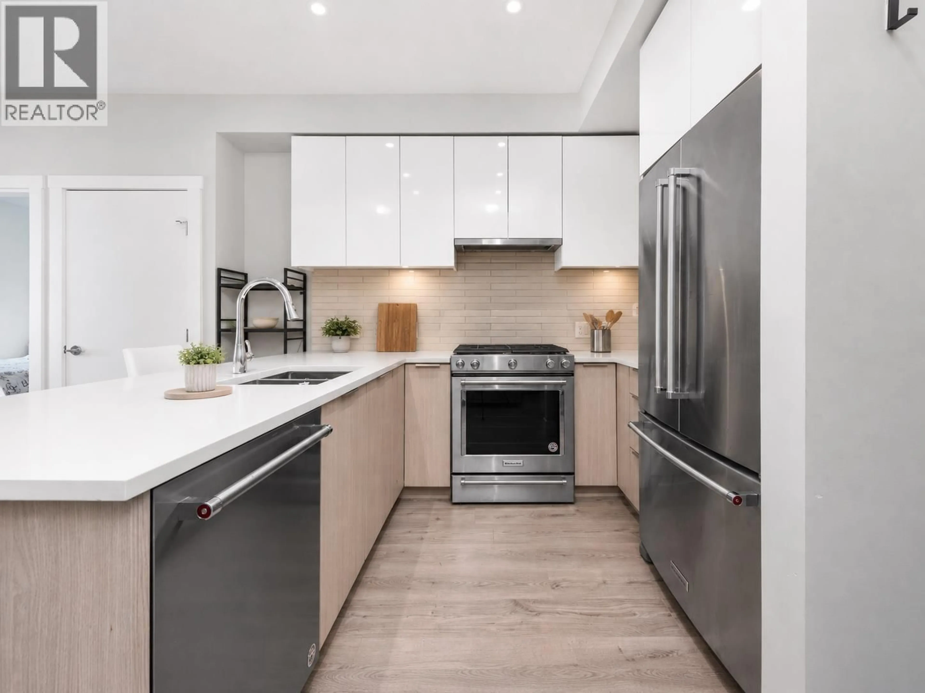 Open concept kitchen, unknown for 309 - 3588 SAWMILL CRESCENT, Vancouver British Columbia V5S0H5