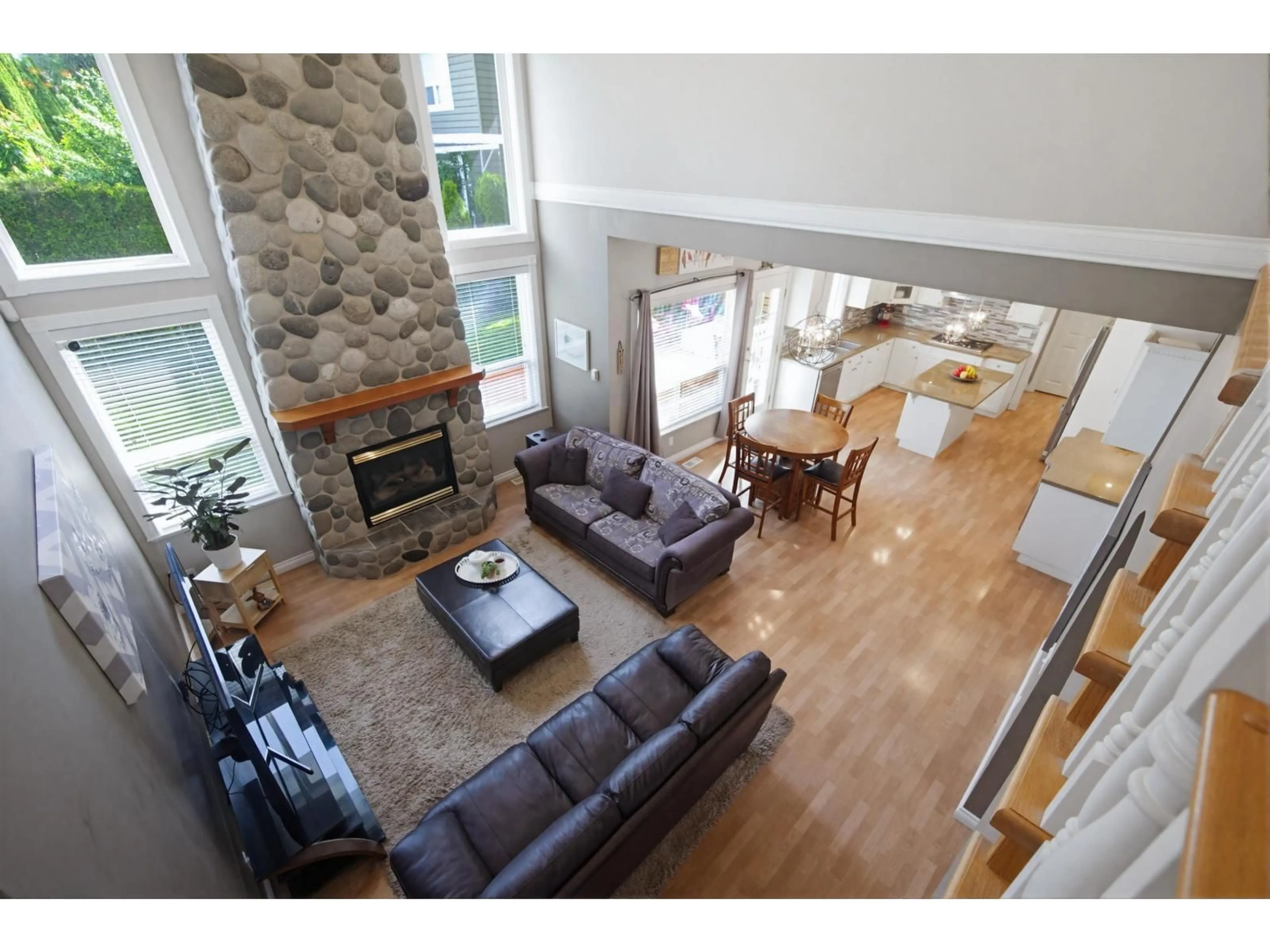 Living room with furniture, wood/laminate floor for 15512 37A AVENUE, Surrey British Columbia V3S0H6
