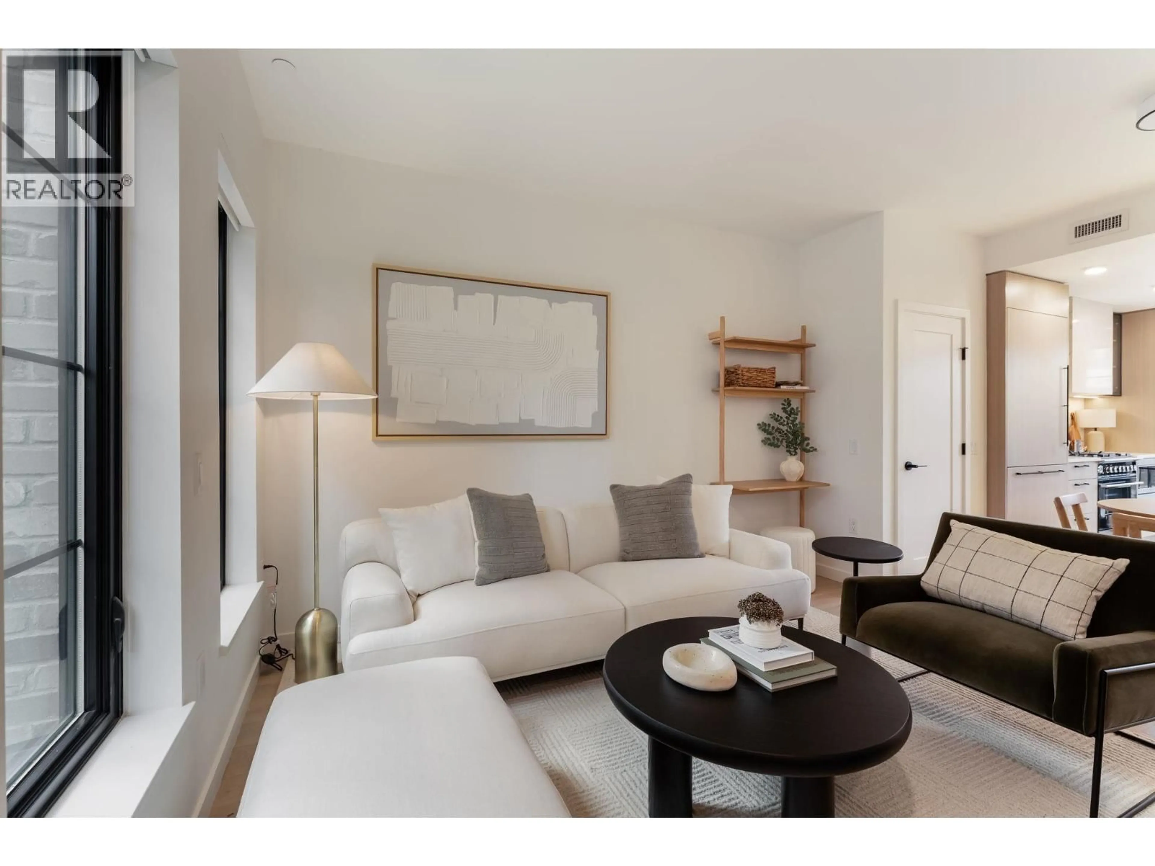 Living room with furniture, wood/laminate floor for 197 KING EDWARD AVENUE, Vancouver British Columbia V5Y4B4