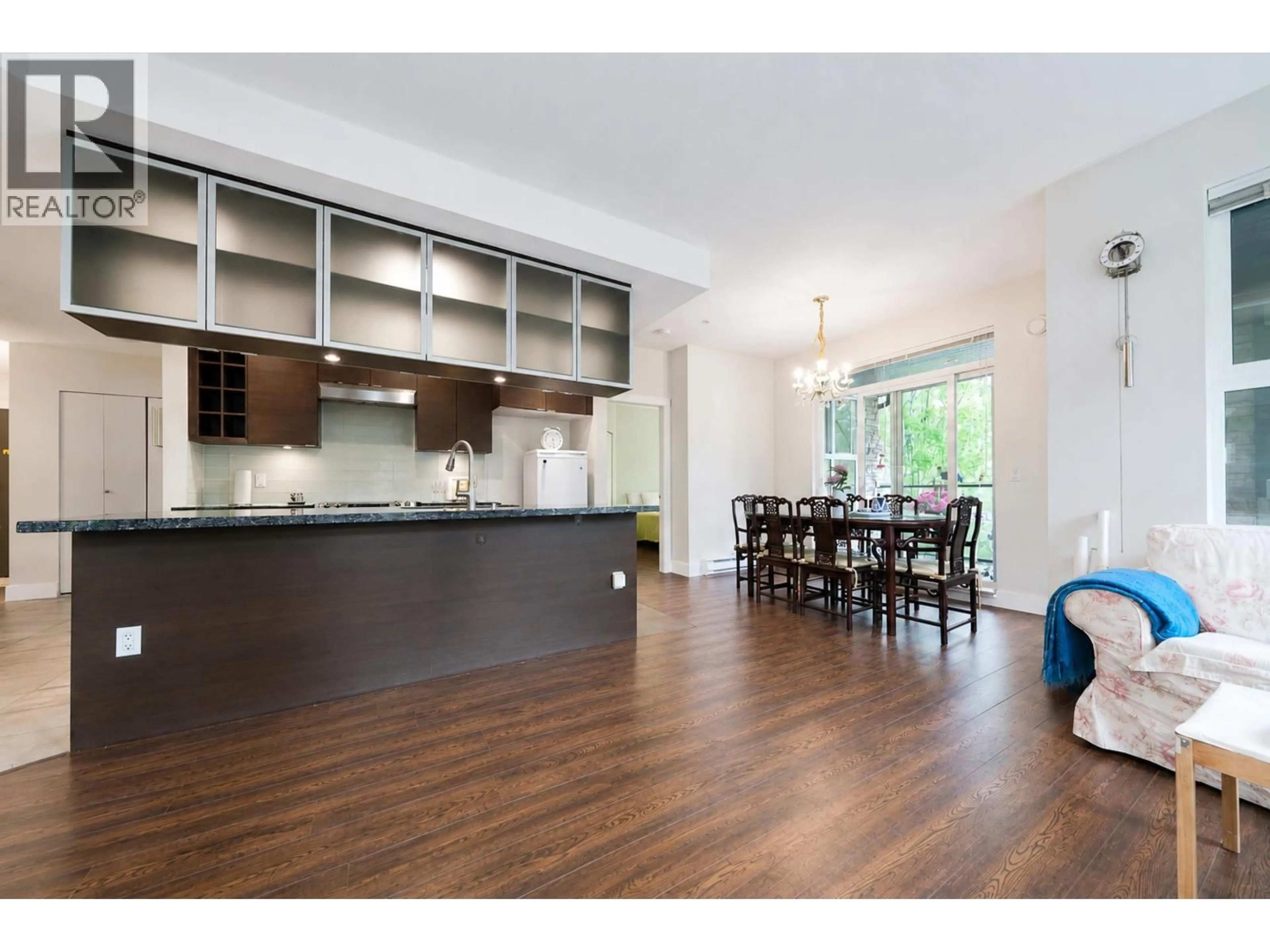Open concept kitchen, wood/laminate floor for 220 - 5928 BIRNEY AVENUE, Vancouver British Columbia V6S0B5