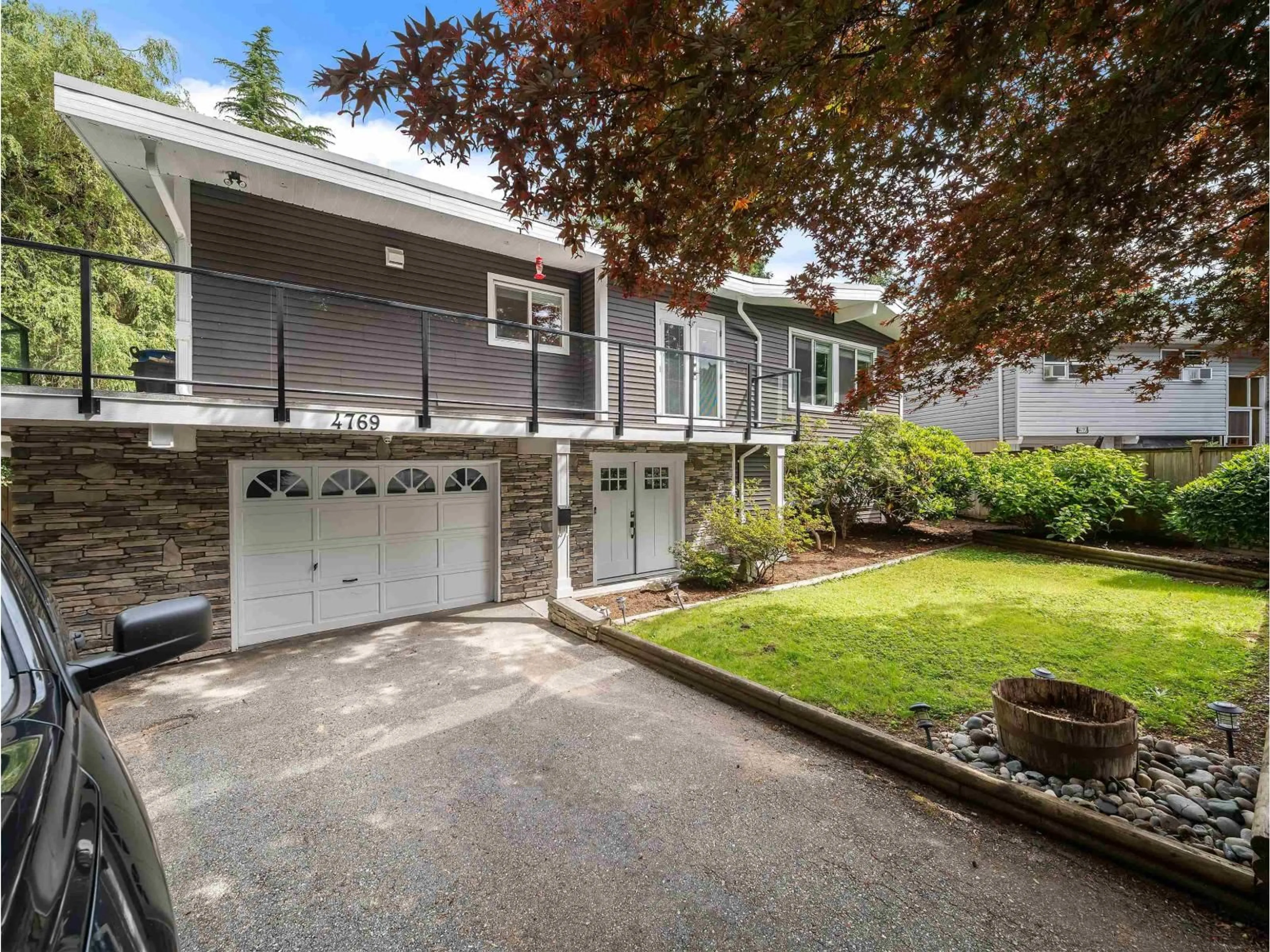 Home with vinyl exterior material, street for 4769 201 STREET, Langley British Columbia V3A6B5