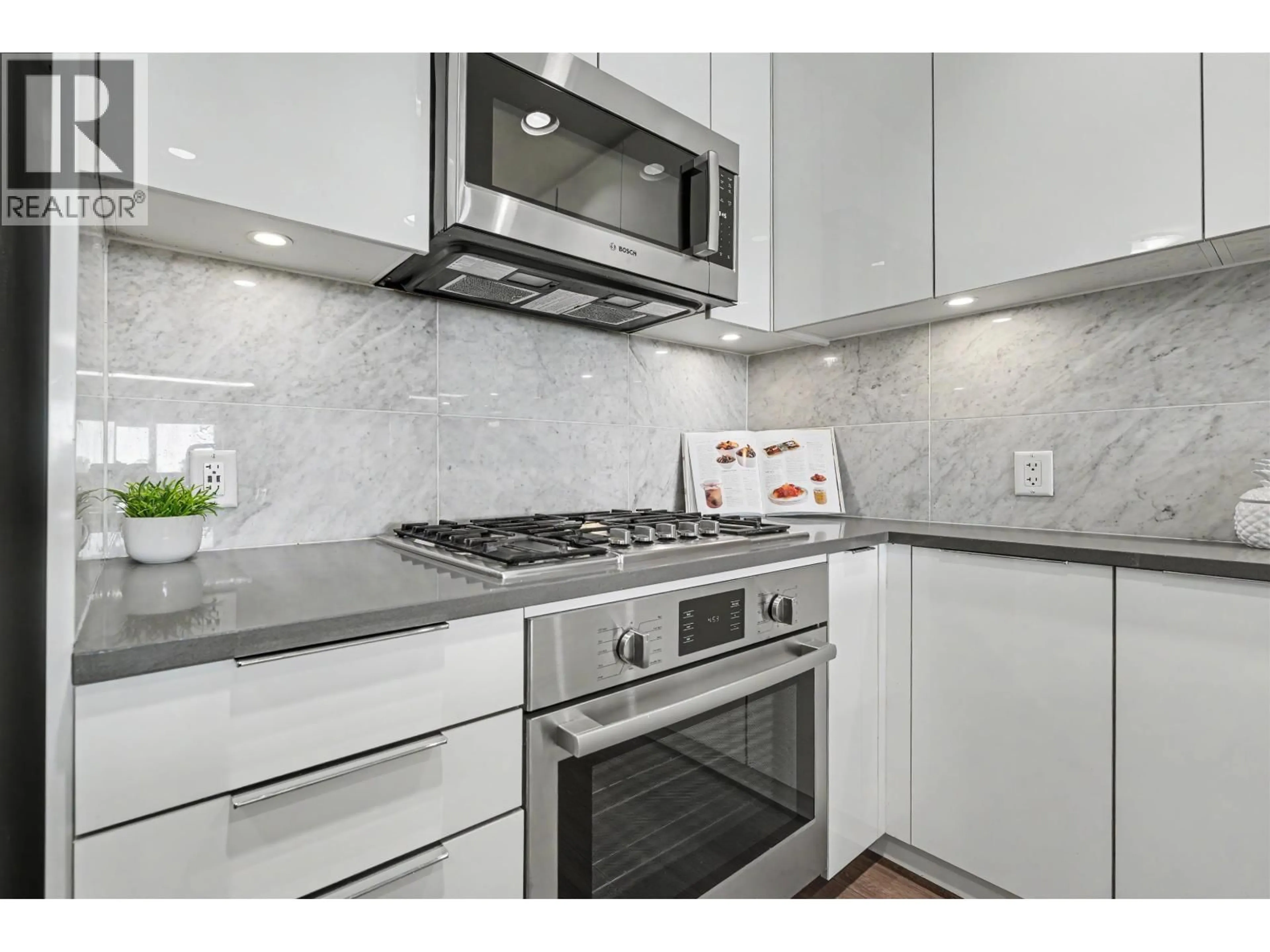 Standard kitchen, ceramic/tile floor for 604 - 3289 RIVERWALK AVENUE, Vancouver British Columbia V5S0G2