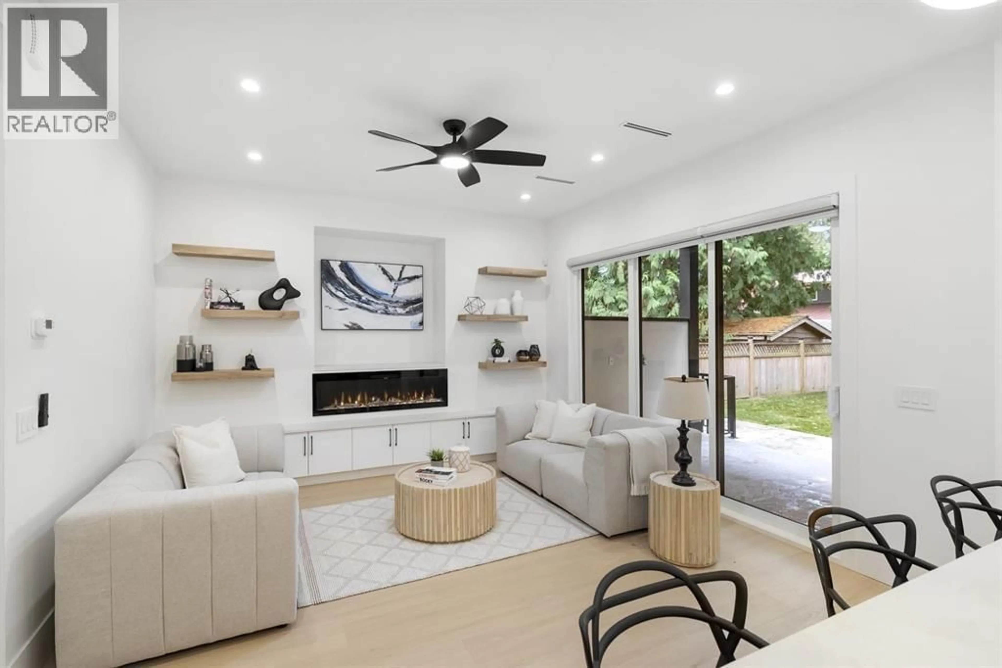 Living room with furniture, ceramic/tile floor for 5666 10A AVENUE, Delta British Columbia V4L1C2