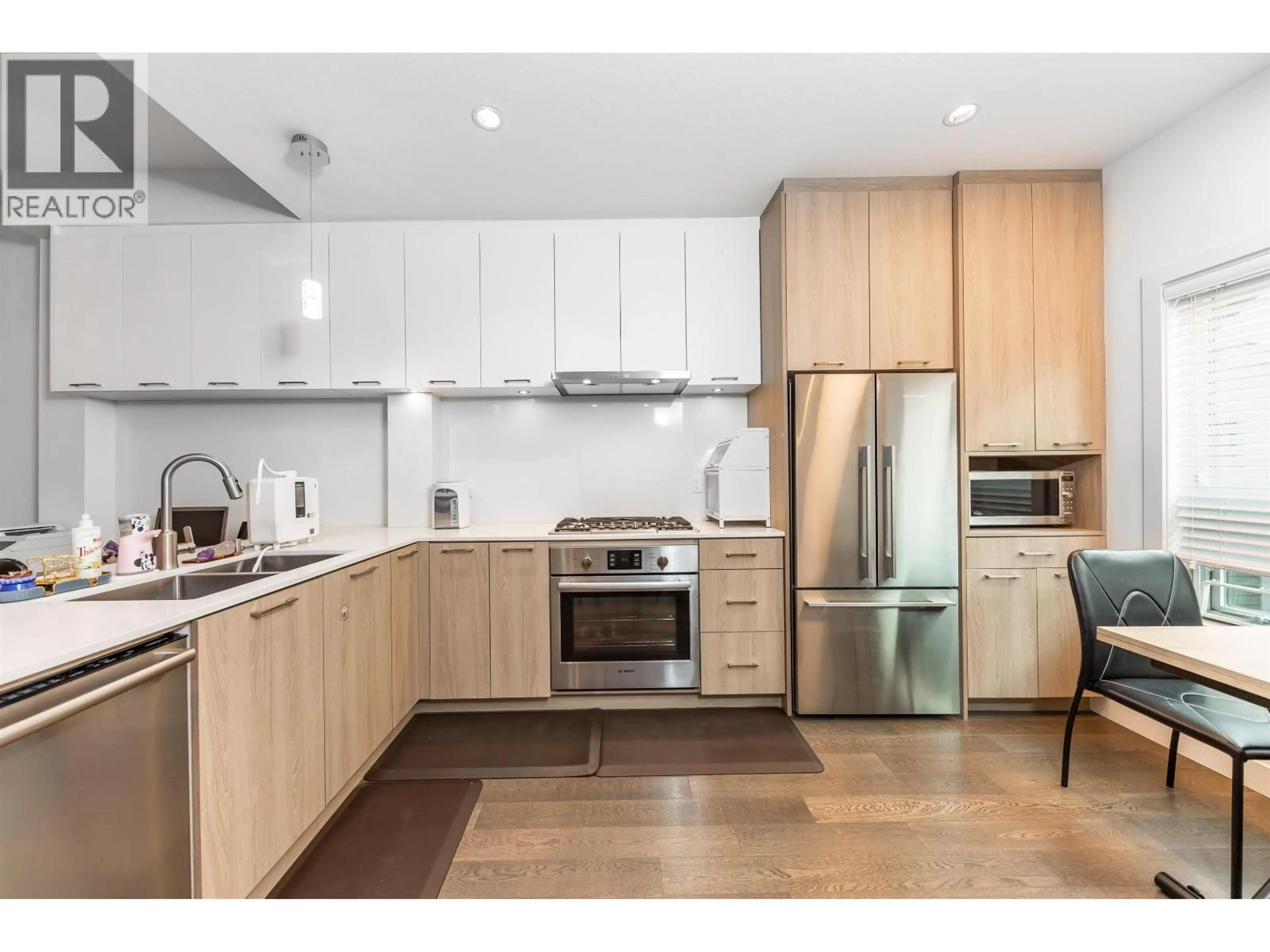 Open concept kitchen, wood/laminate floor for 21 - 7168 LYNNWOOD DRIVE, Richmond British Columbia V7C0E3