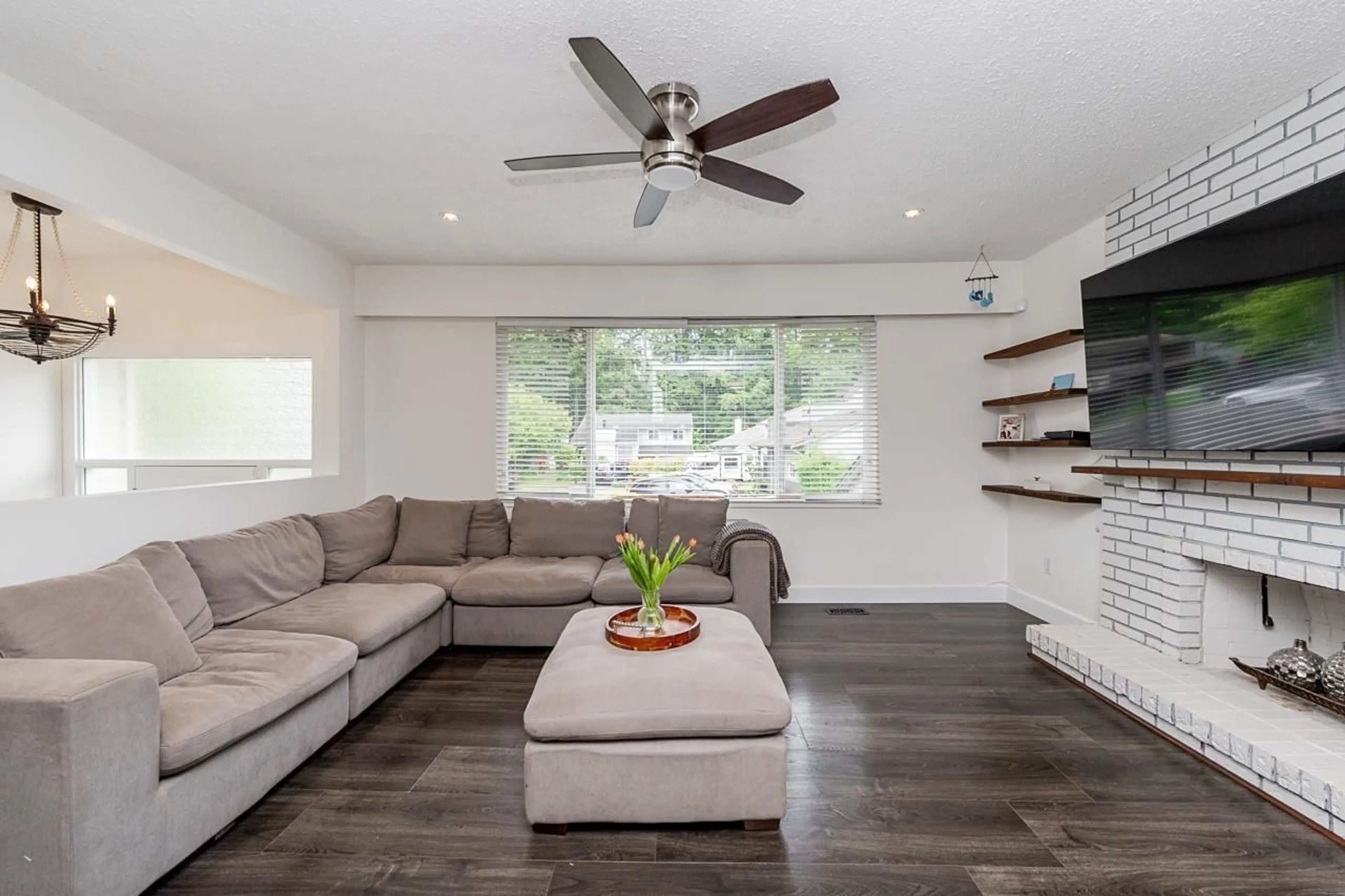 Living room with furniture, wood/laminate floor for 11792 80A AVENUE, Delta British Columbia V4C7T9