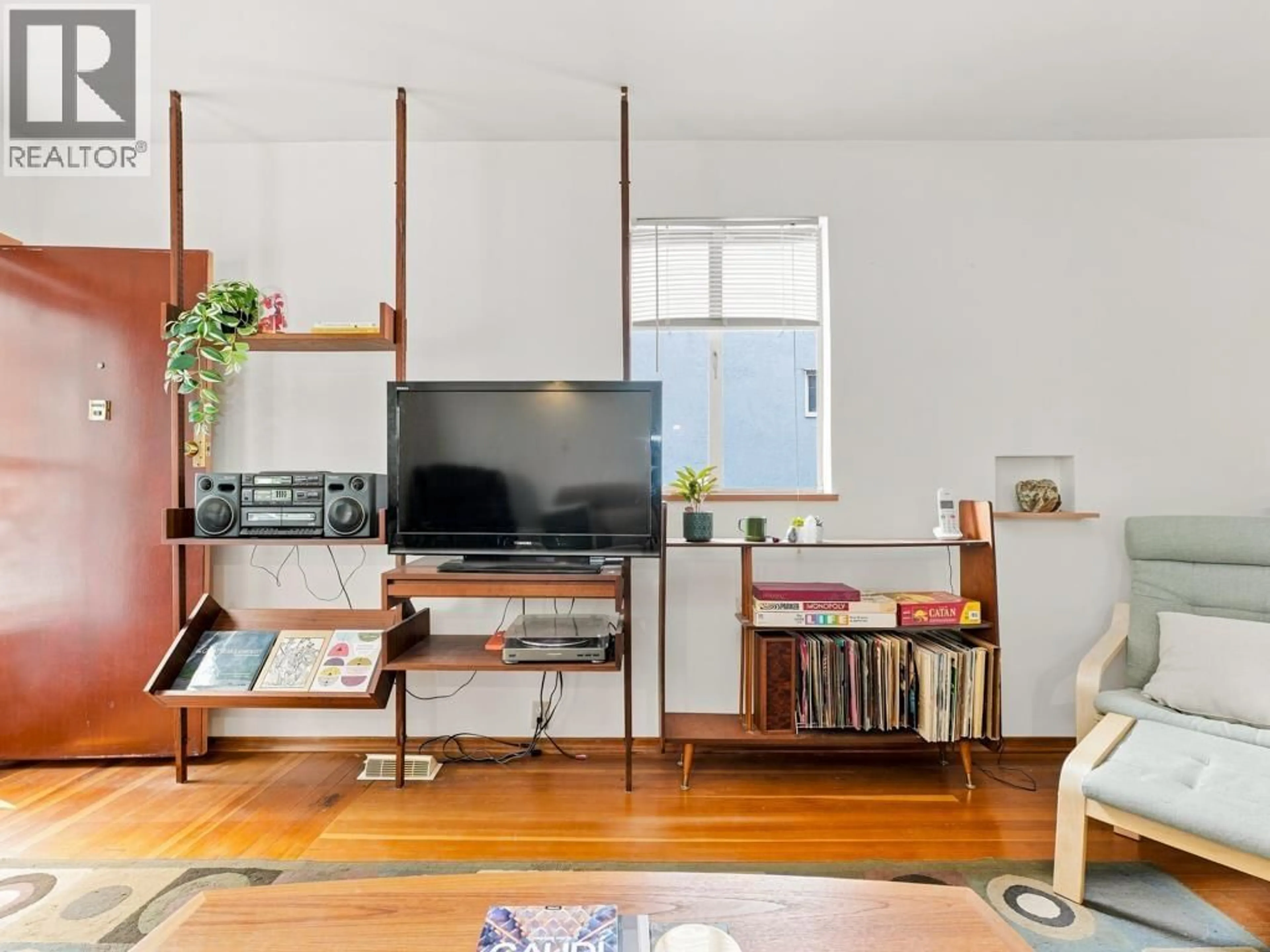 Living room with furniture, wood/laminate floor for 3017 17TH AVENUE, Vancouver British Columbia V5M2N5
