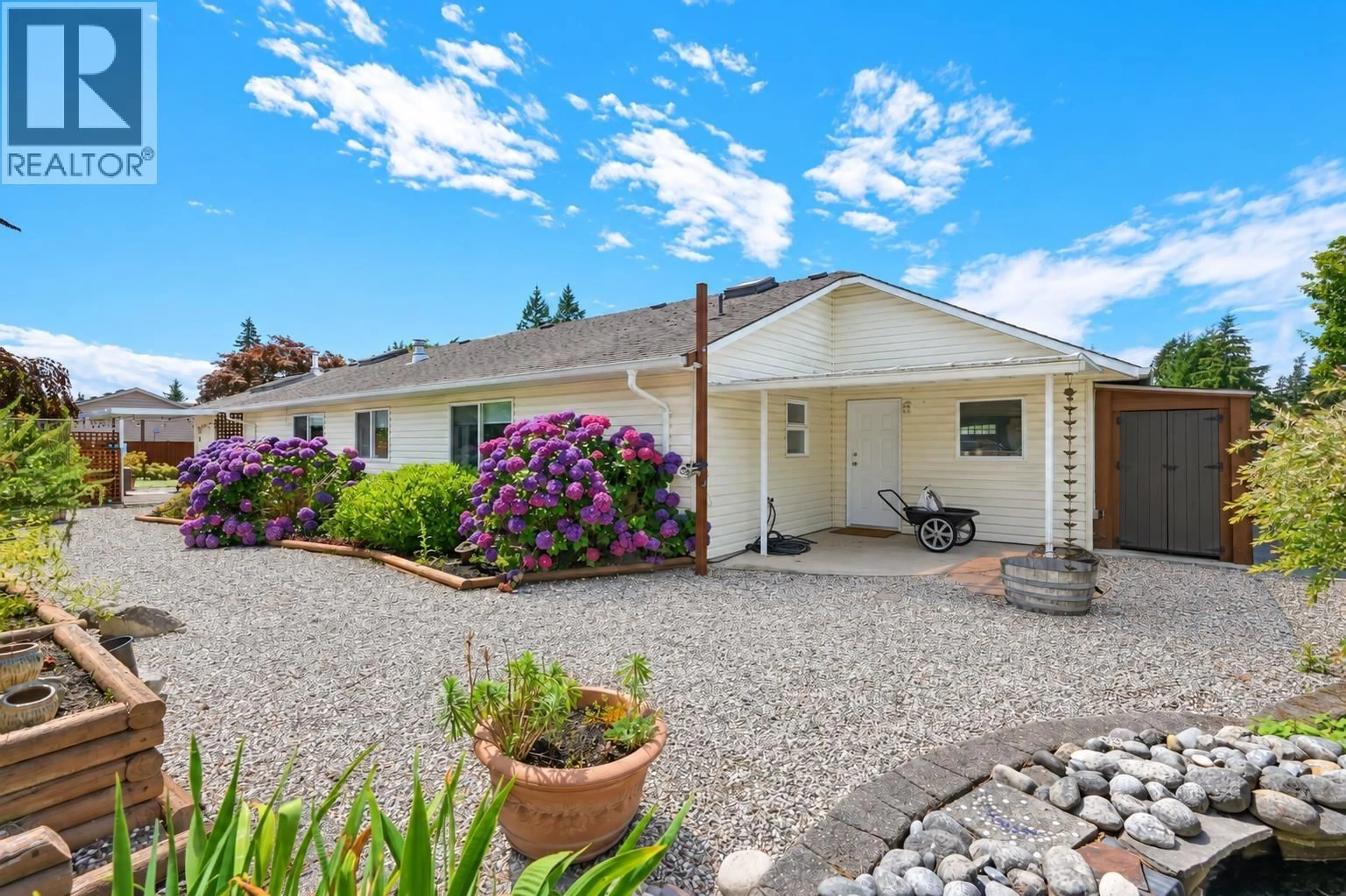 Home with vinyl exterior material, street for 5616 EMERSON ROAD, Sechelt British Columbia V0N3A7