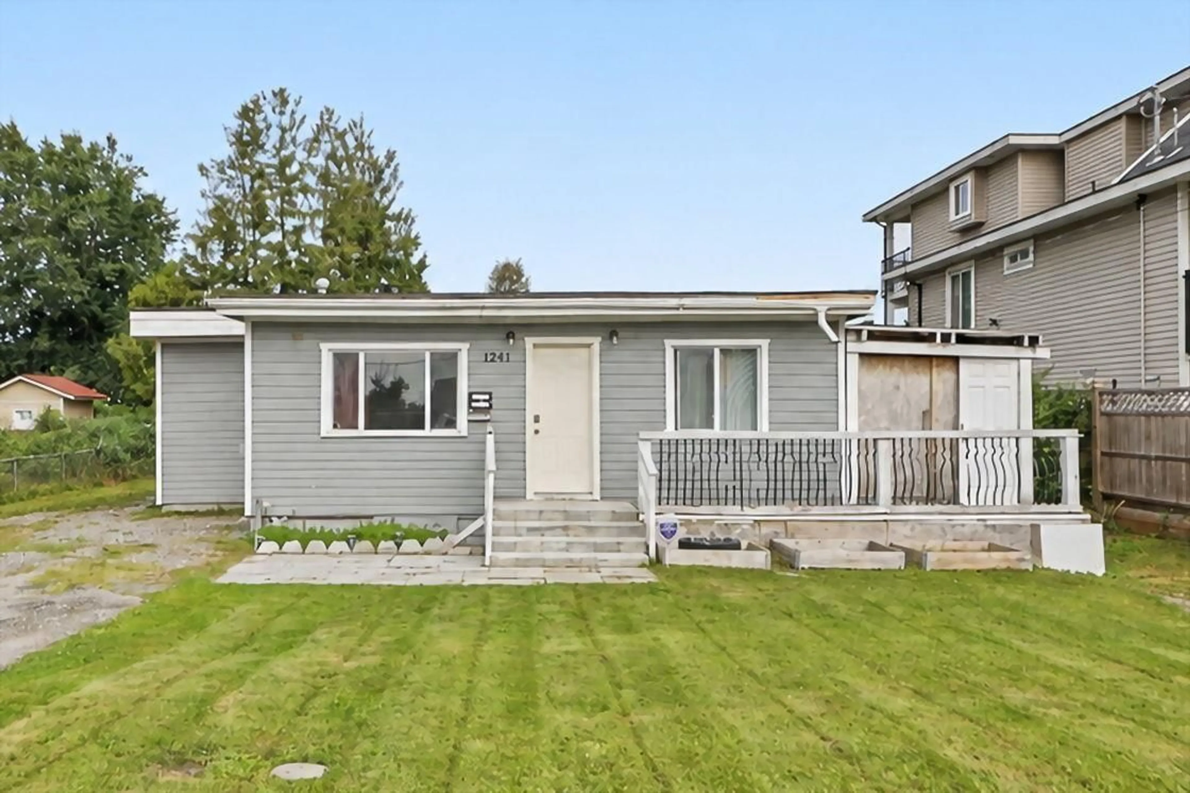Home with vinyl exterior material, street for 12441 113 AVENUE, Surrey British Columbia V3V3L8