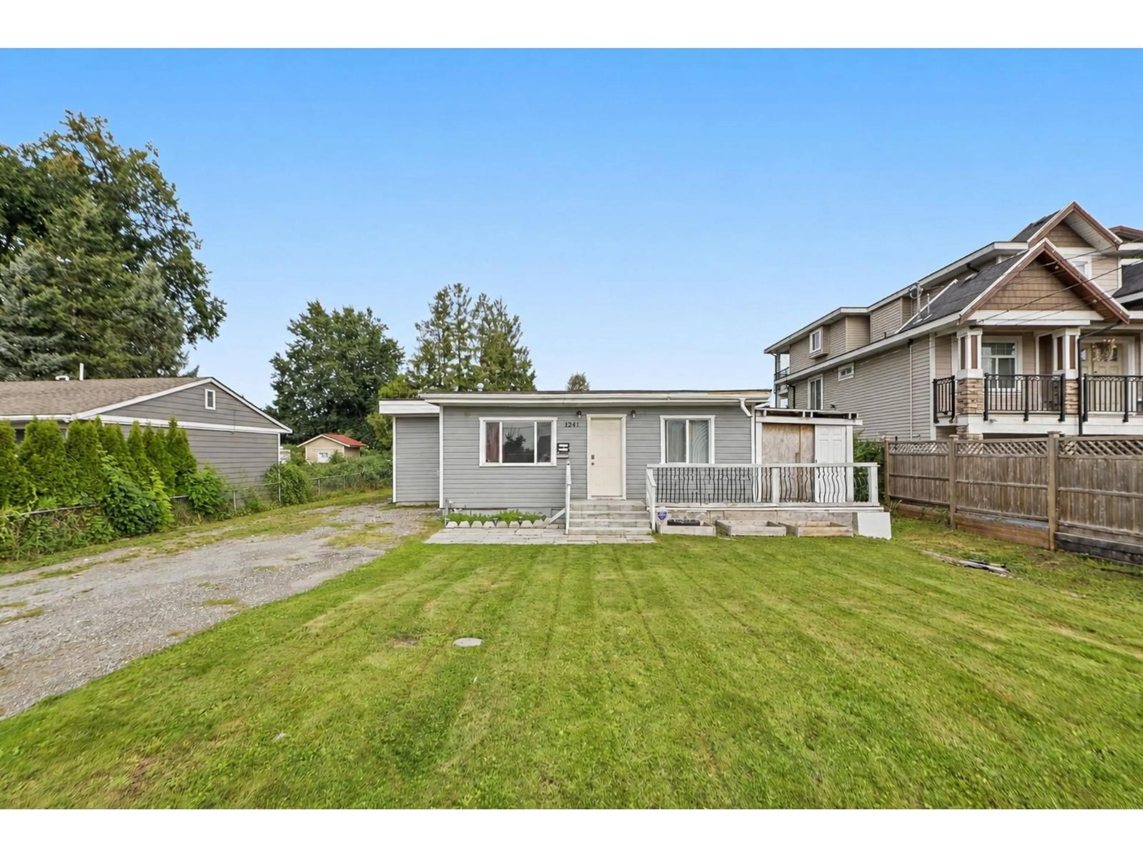 A pic from outside/outdoor area/front of a property/back of a property/a pic from drone, street for 12441 113 AVENUE, Surrey British Columbia V3V3L8