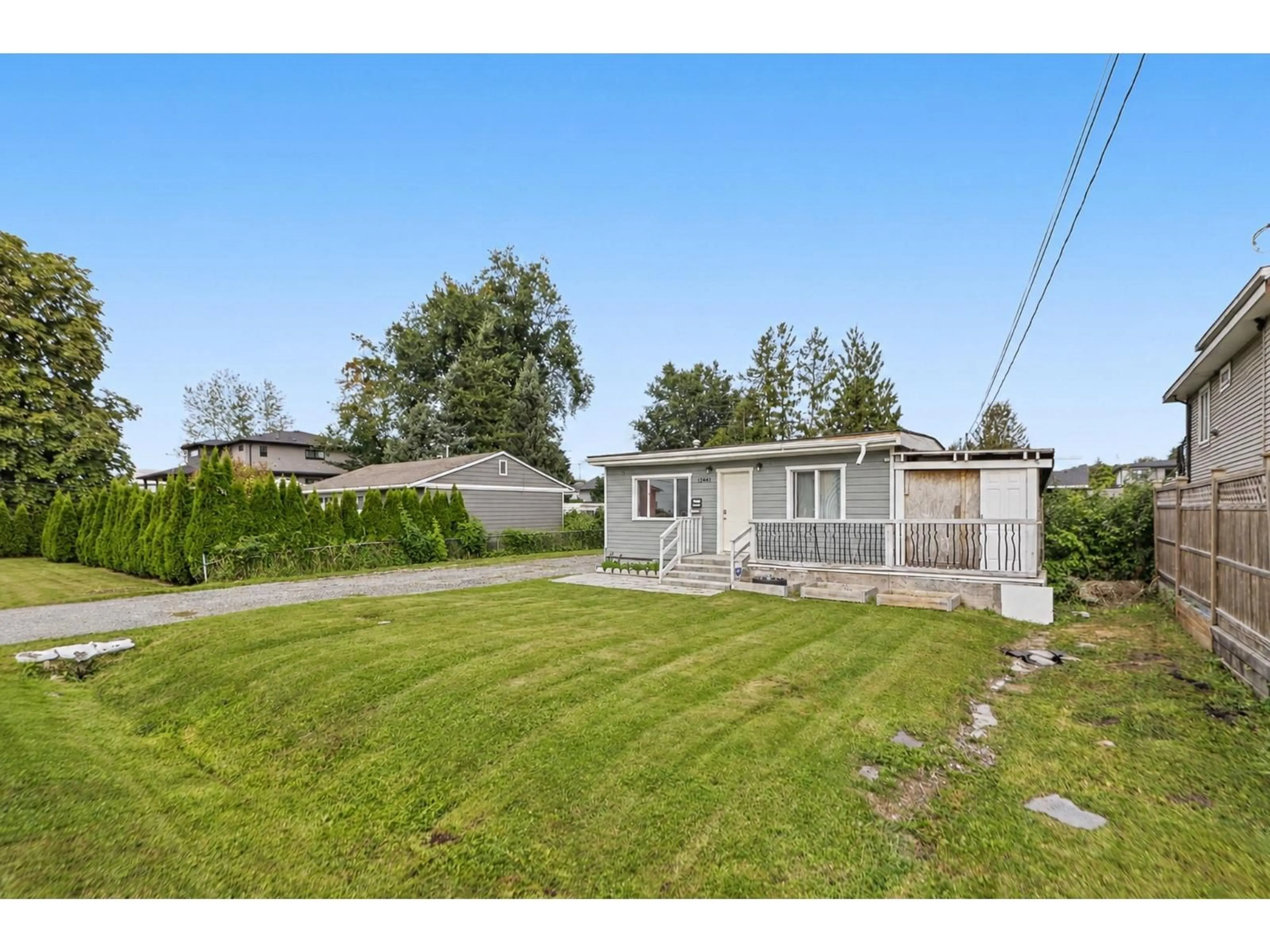 A pic from outside/outdoor area/front of a property/back of a property/a pic from drone, unknown for 12441 113 AVENUE, Surrey British Columbia V3V3L8